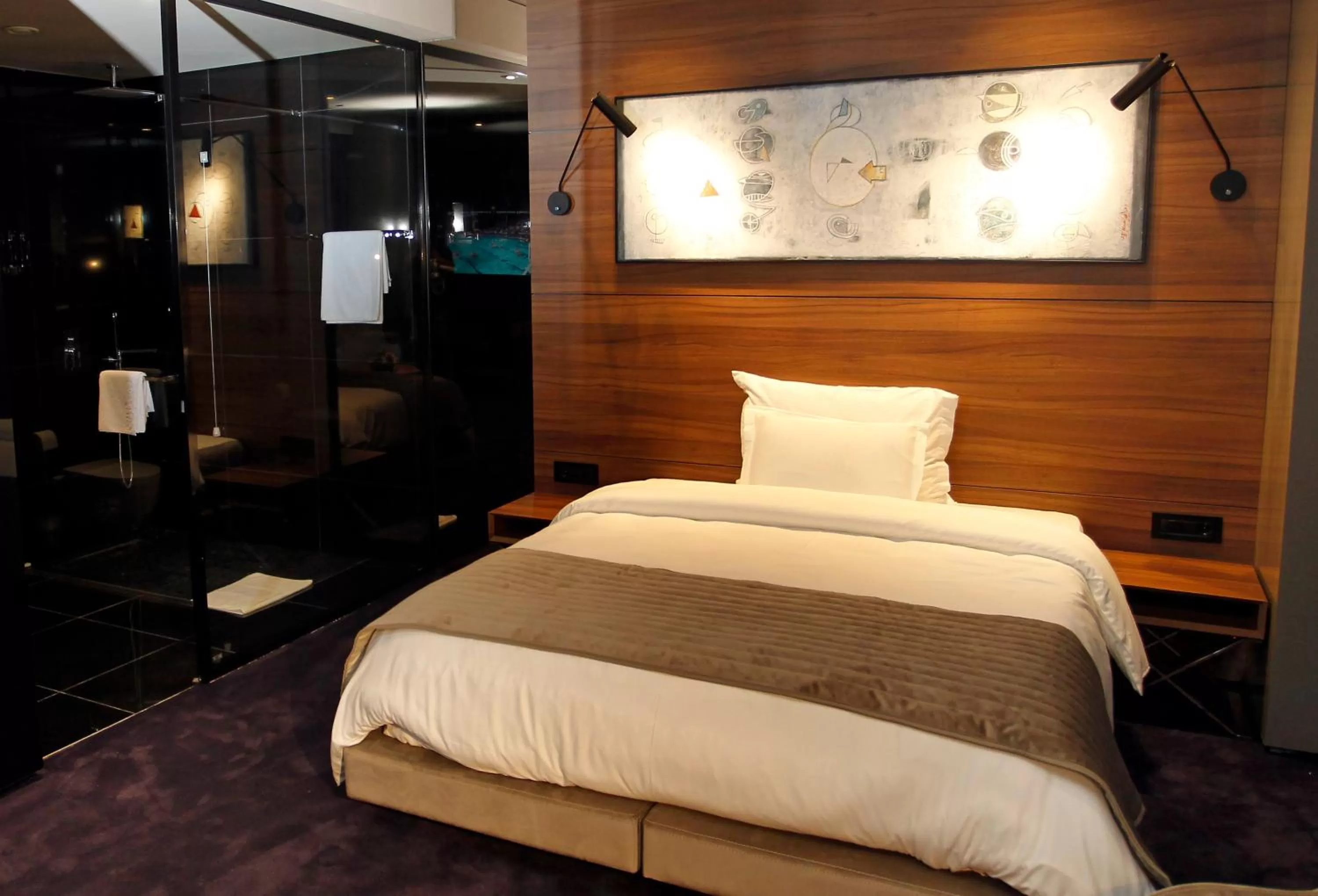 Bed in Ambasador Hotel