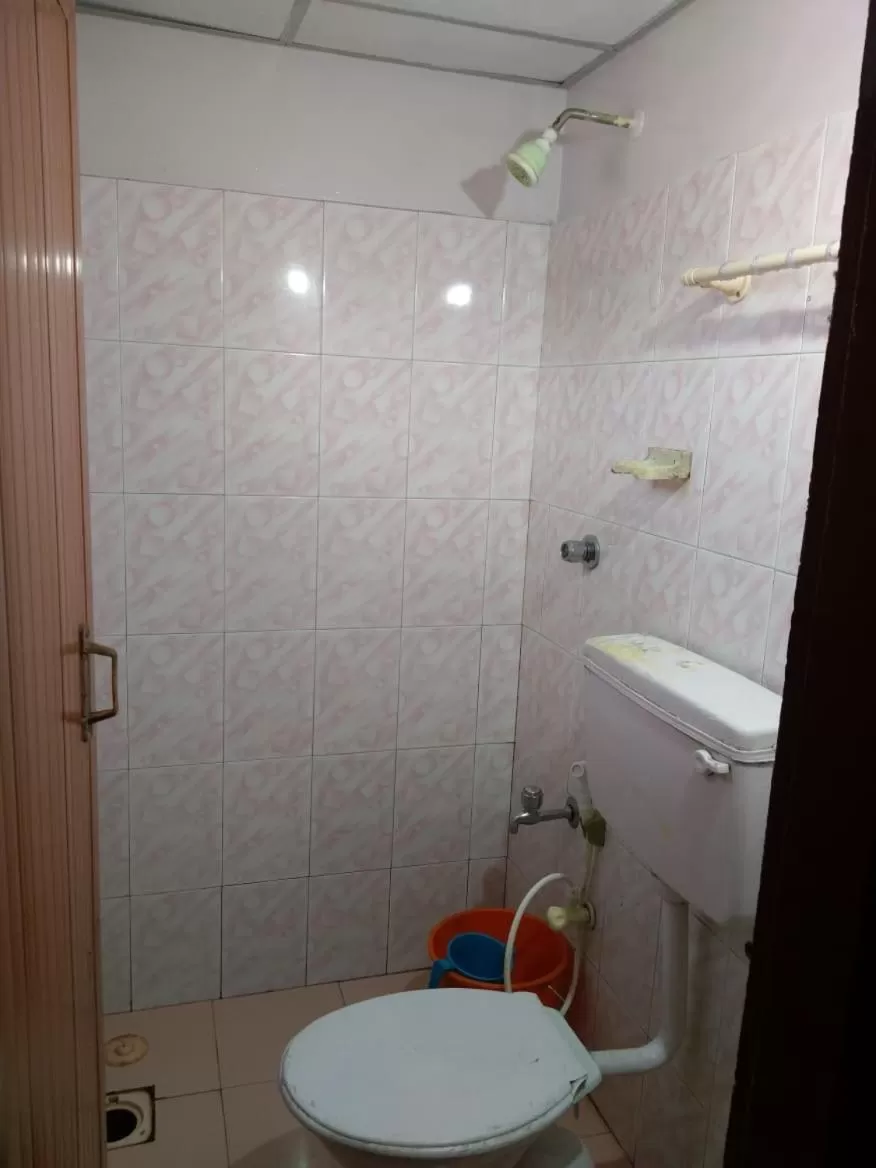 Bathroom in Anandan Tourist Home