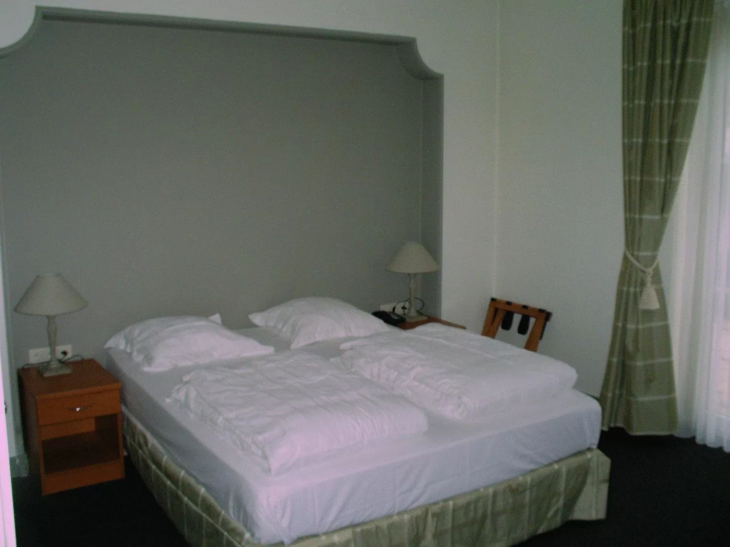 Bed in Hotel Malcot