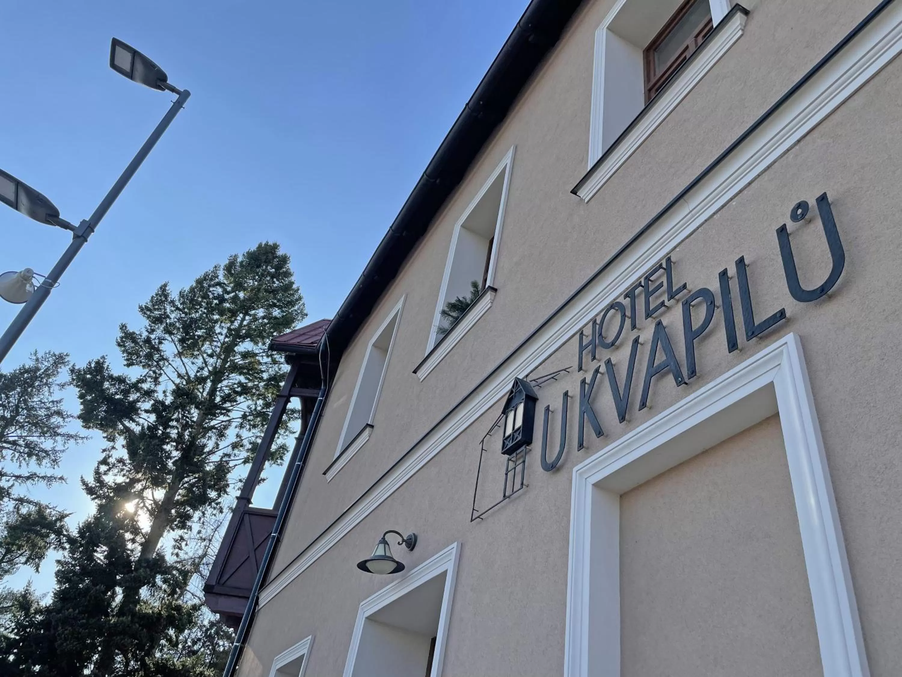 Property logo or sign in Hotel U Kvapilů