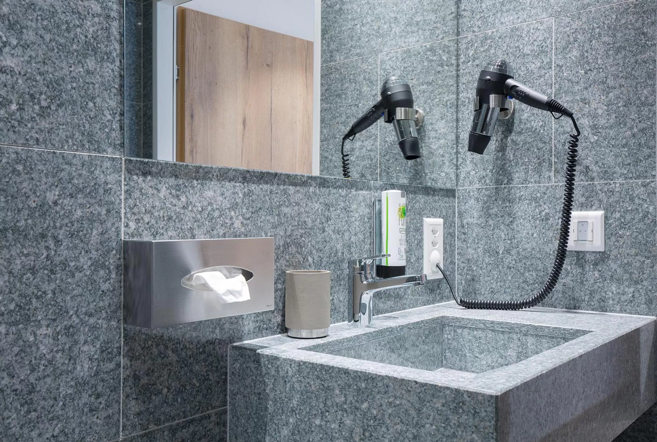 Bathroom in Hotel Vaduzerhof by b-smart