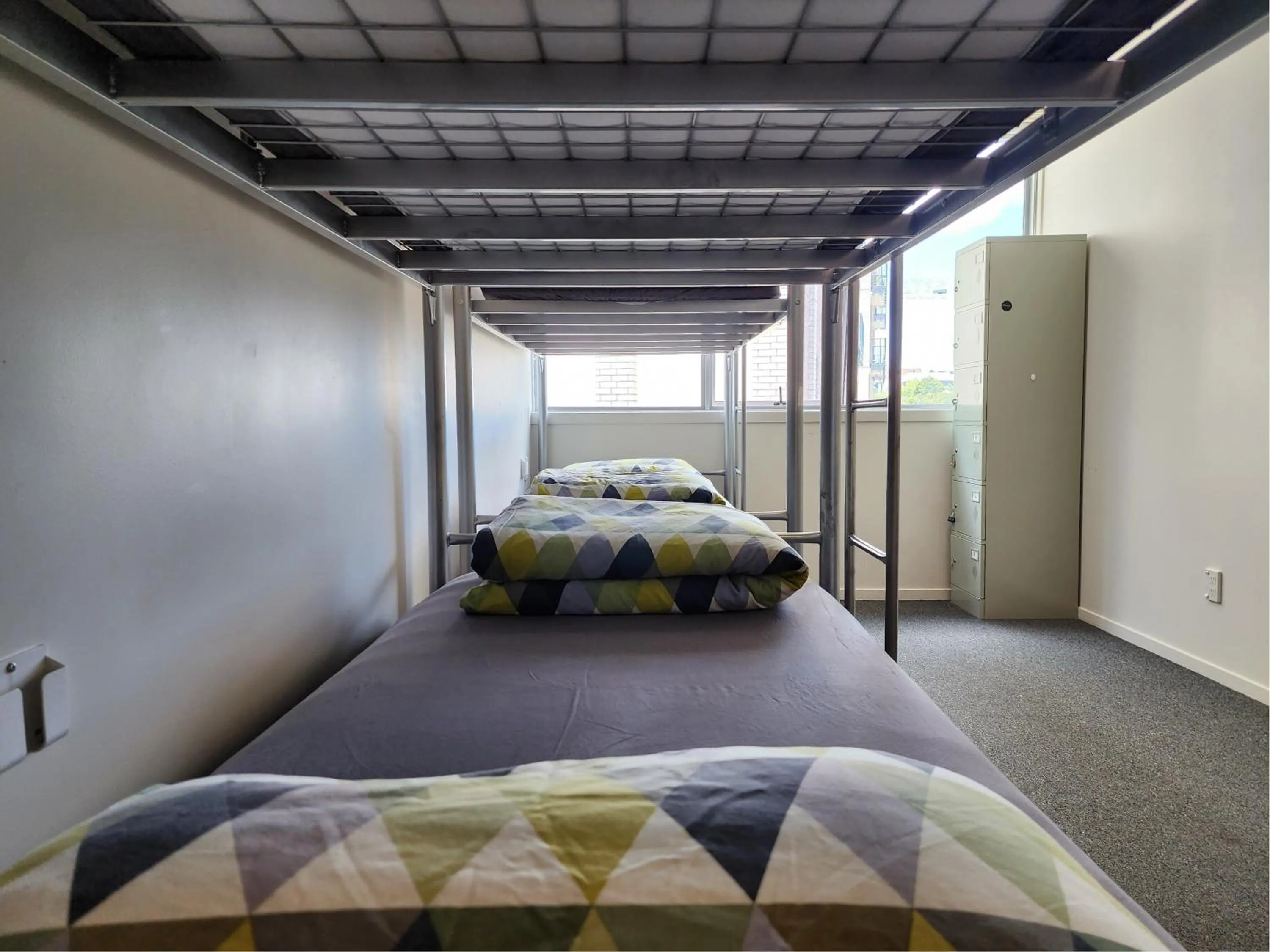 Bed in Newton Lodge Auckland