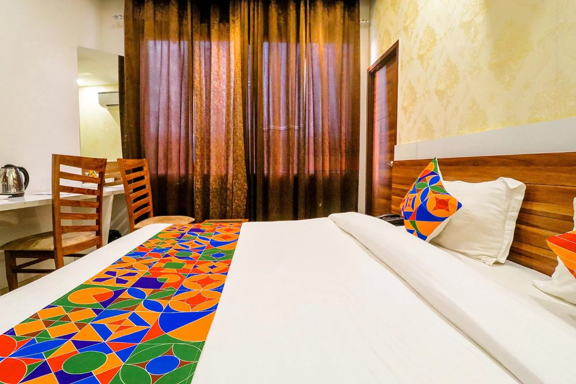 Bed in FabHotel Golden Velvet