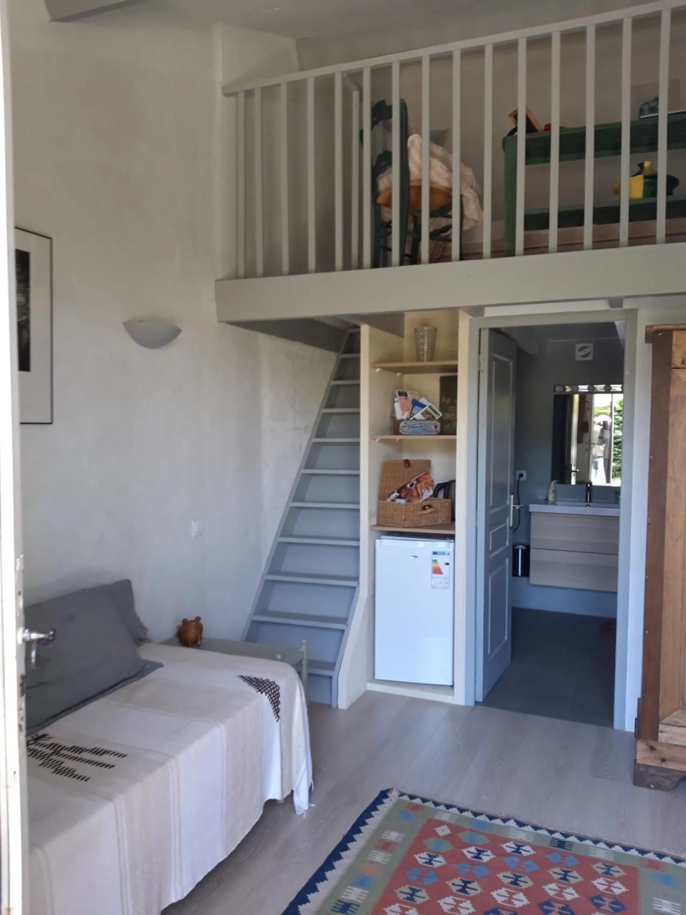 Seating area, Bed in Chambres d'Hôtes Aux Tournesols