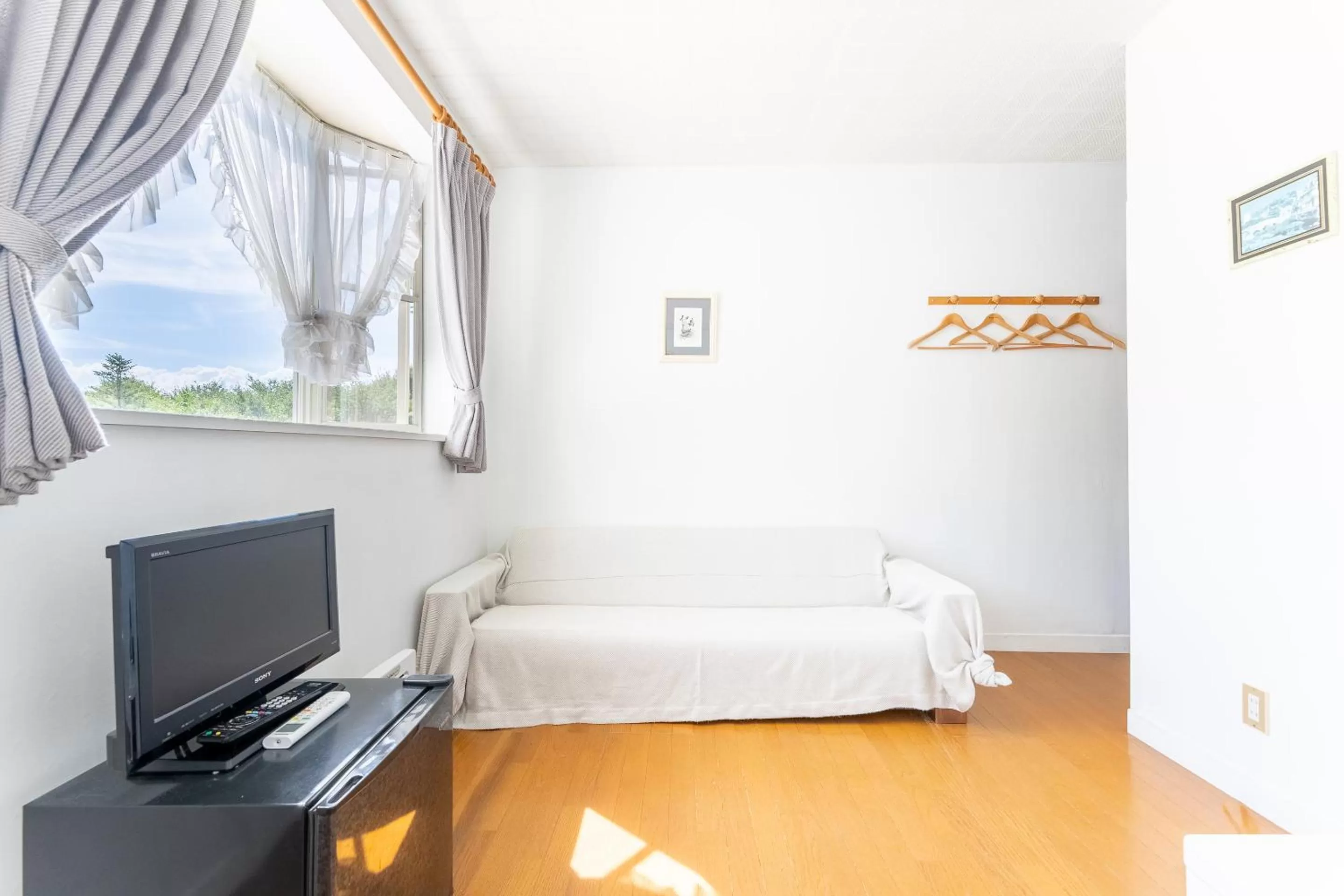 Living room, Bed in Tabist Kiyosato Grandeur Yatsugatake