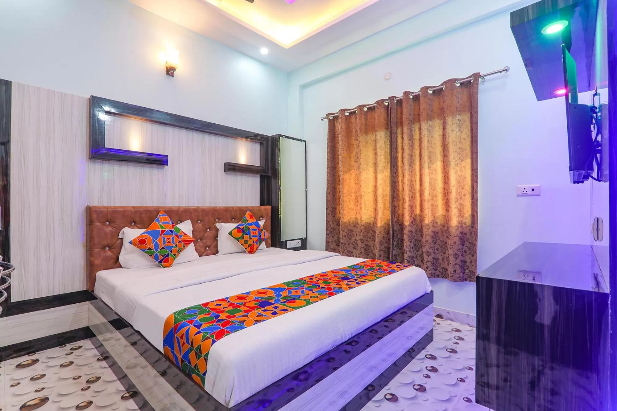 Bed in FabHotel Lumbini International