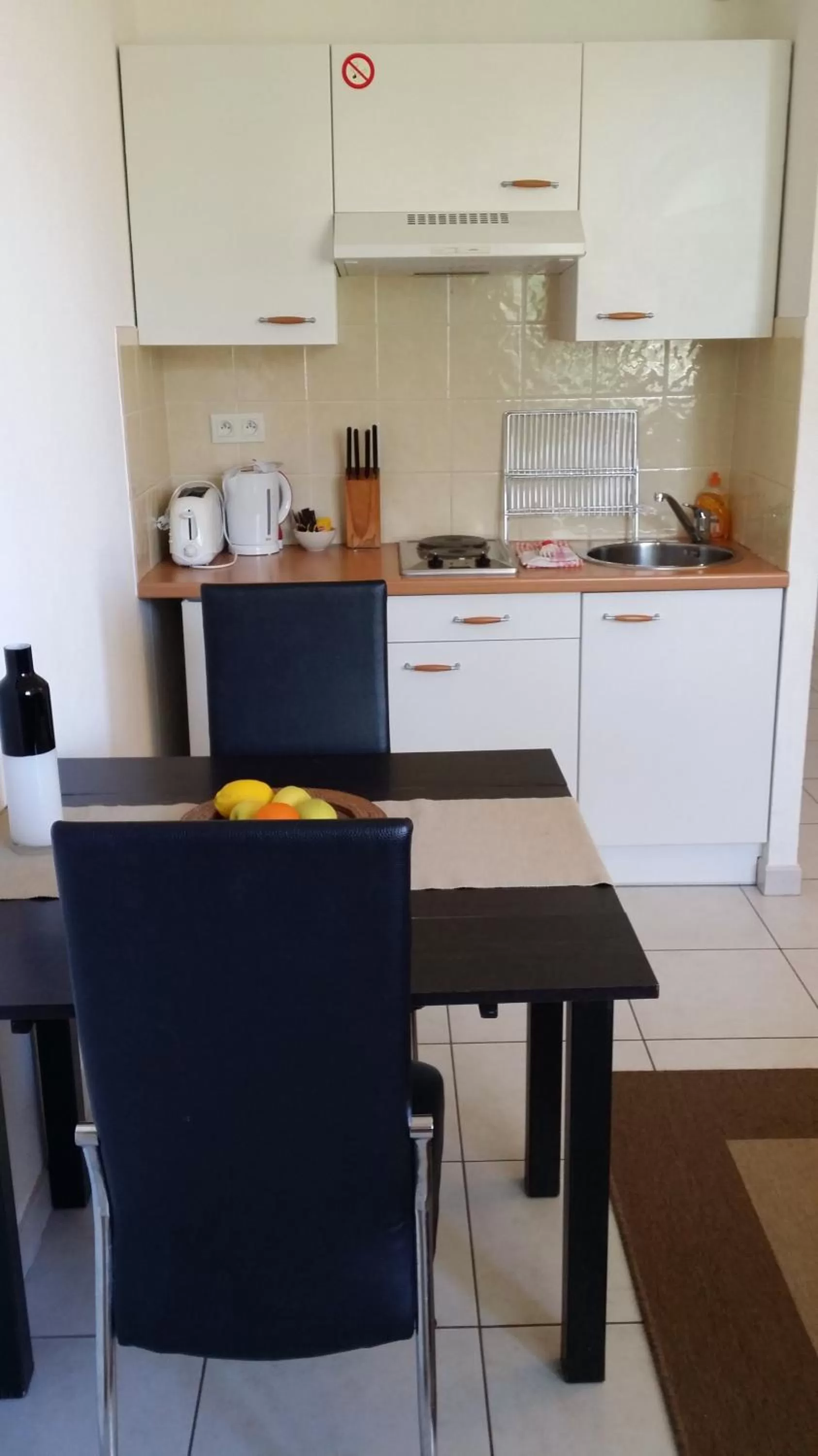 Kitchen or kitchenette in Kimi Résidence