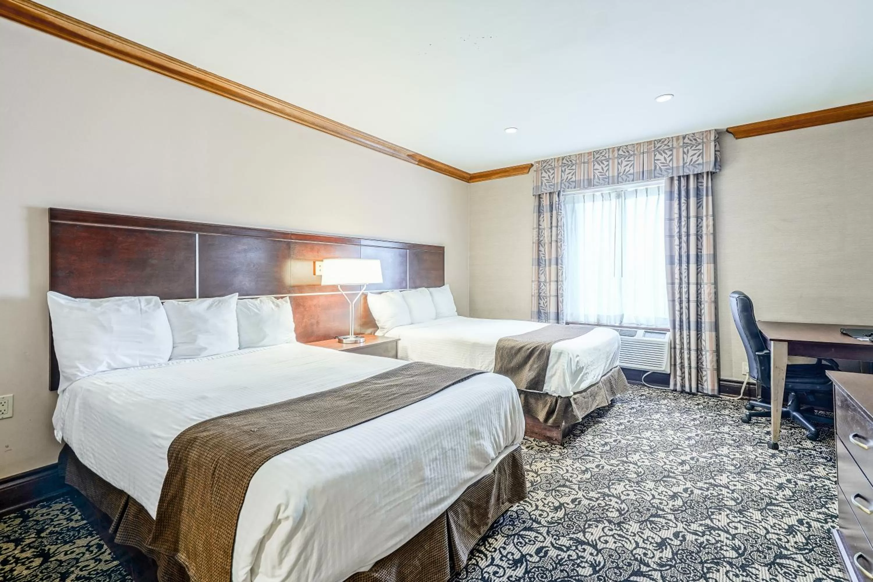 Photo of the whole room, Bed in Woodbine Hotel & Suites