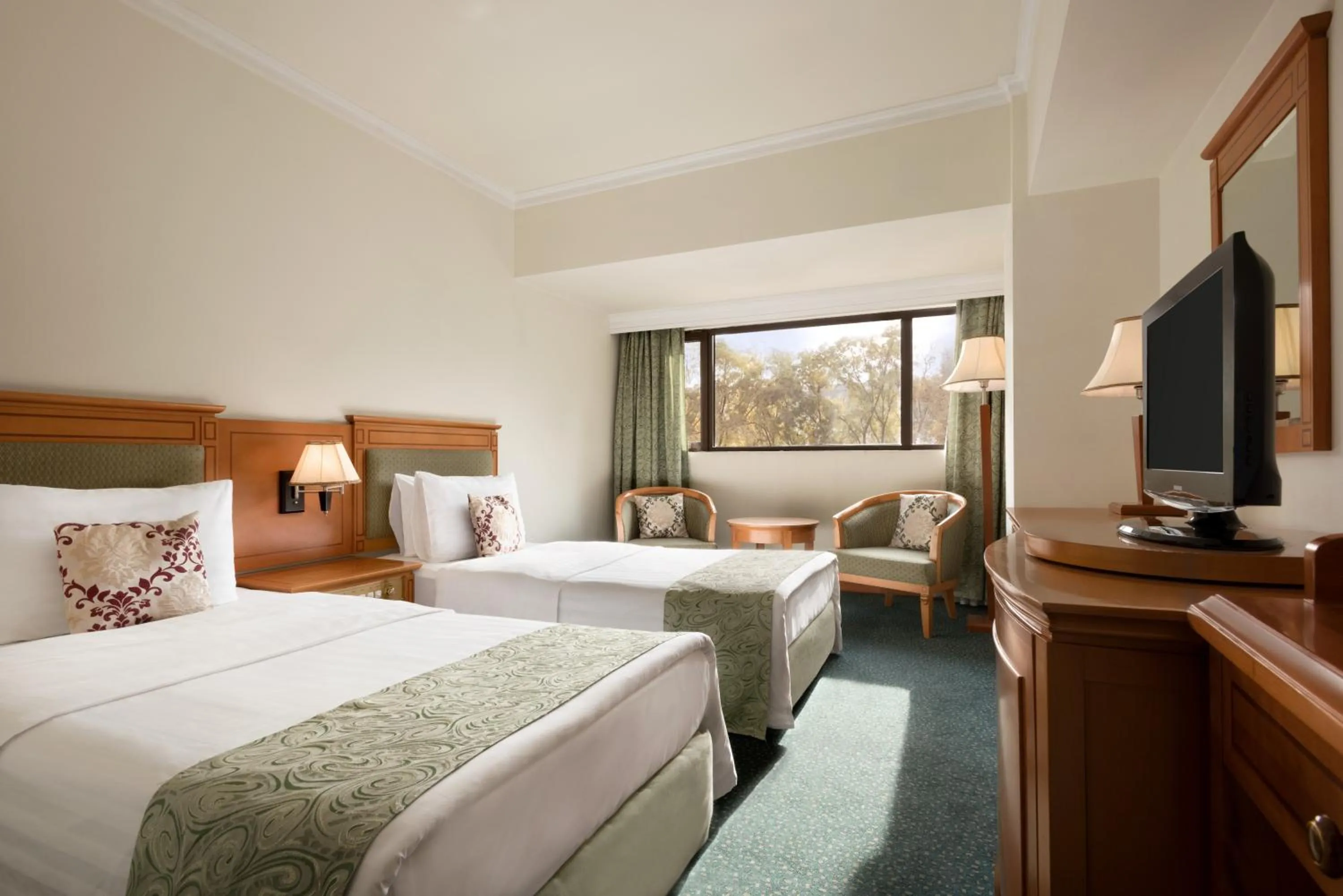 Bed in Ramada by Wyndham Tashkent