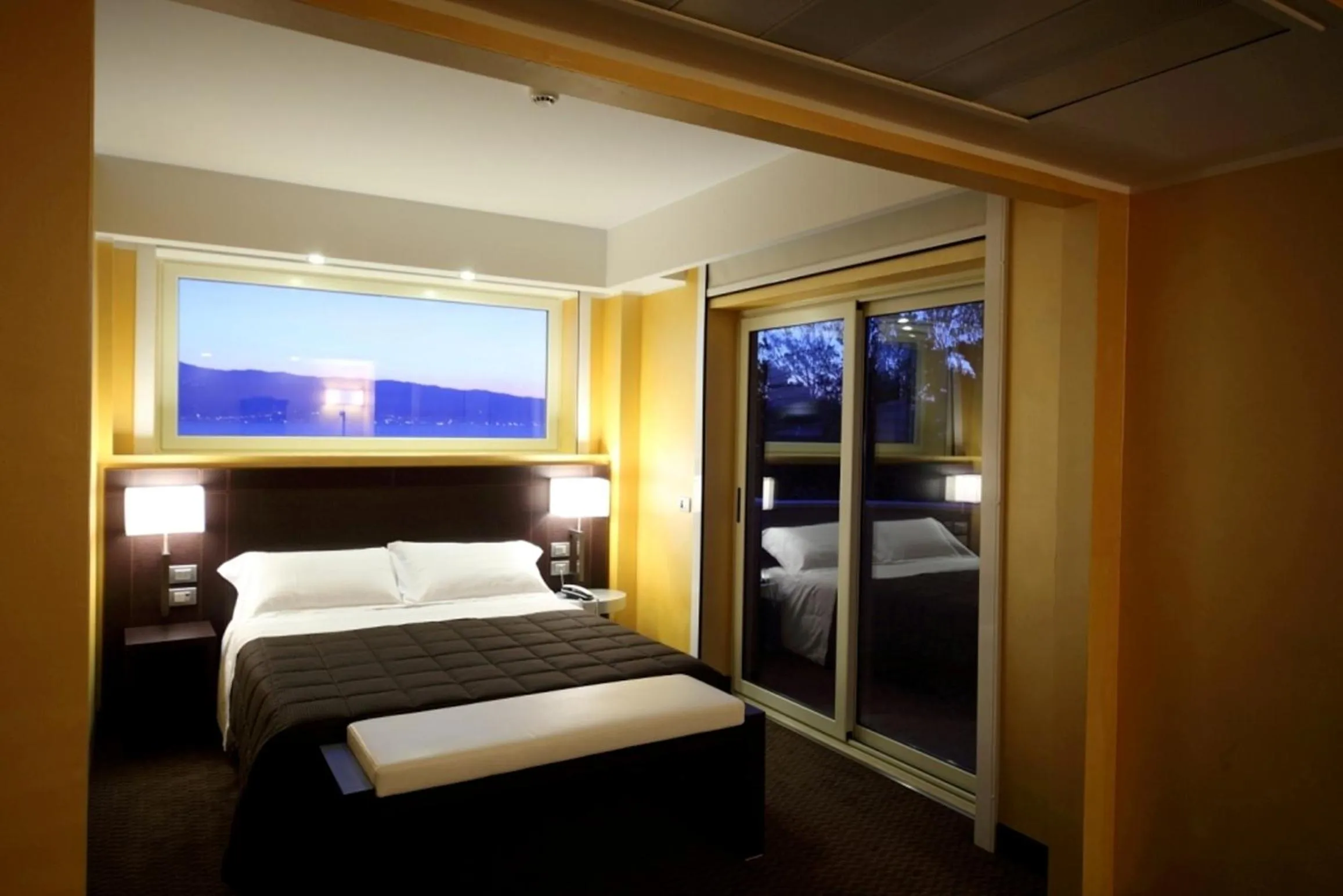 Photo of the whole room, Bed in E' Hotel