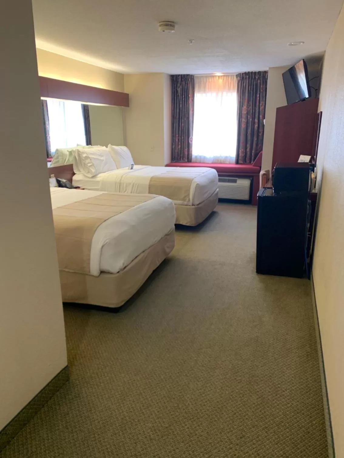Photo of the whole room, Bed in Microtel Inn & Suites by Wyndham Hattiesburg