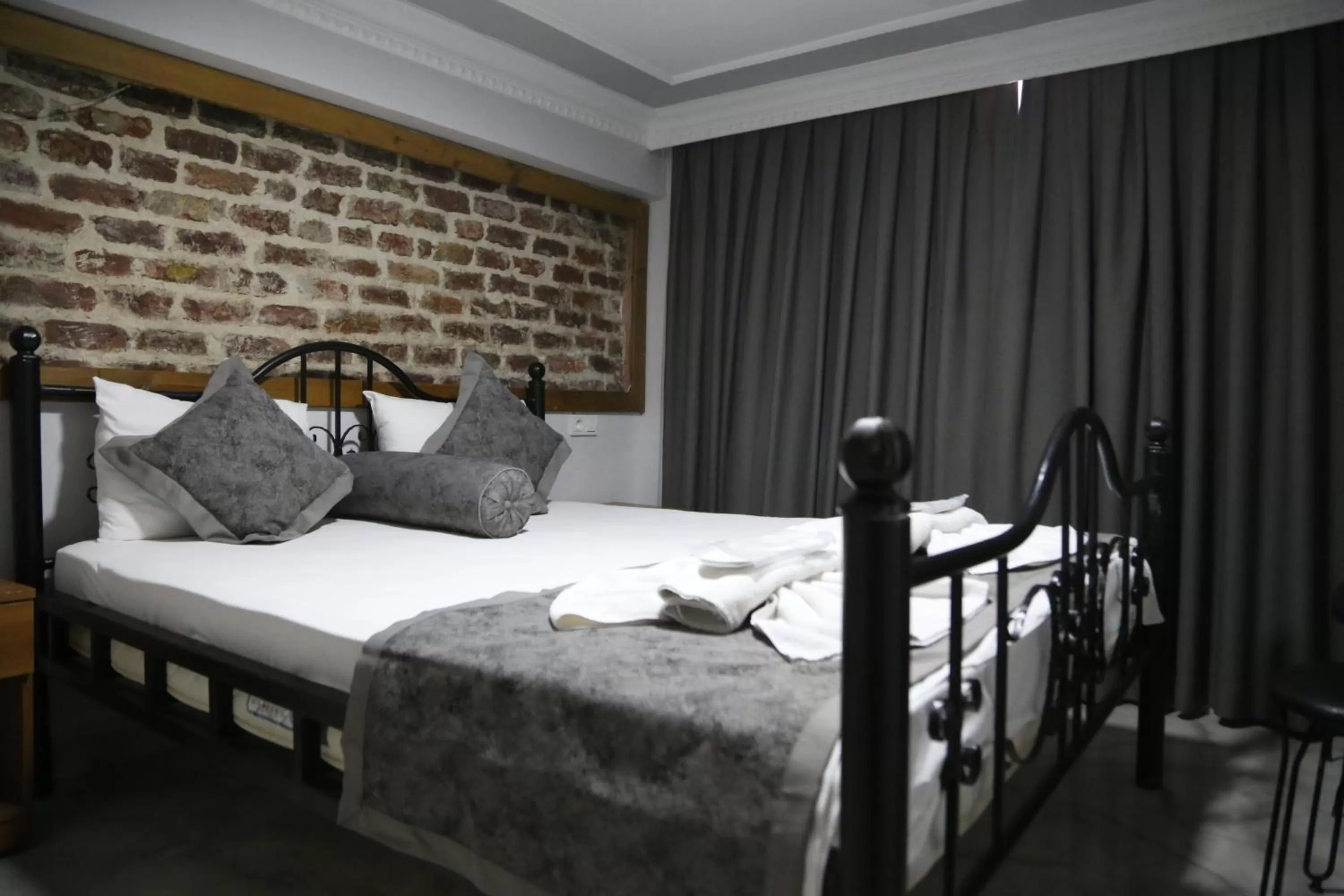 Bed in Arat Apartments