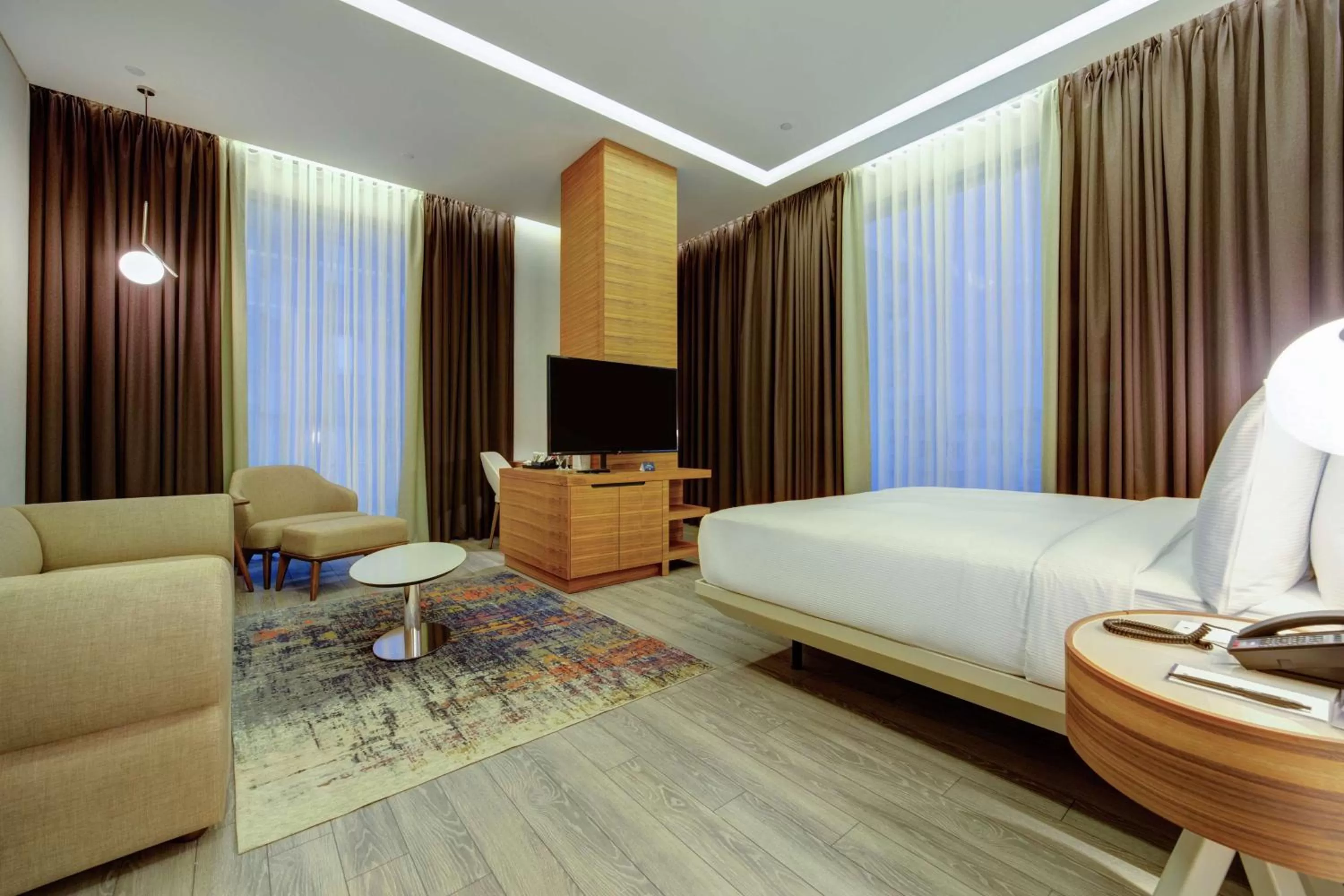 Living room, Bed in DoubleTree by Hilton Adana