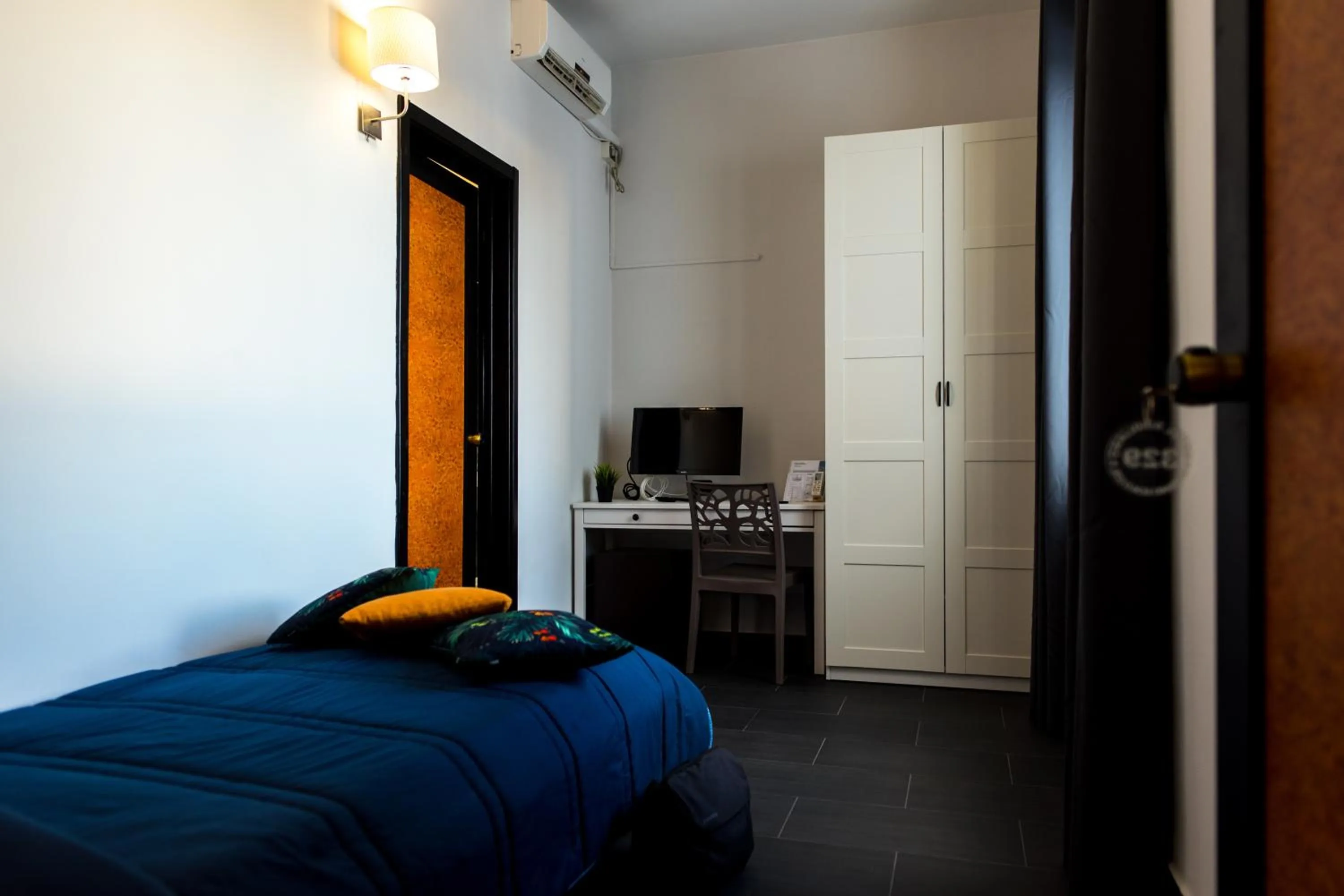 Bed in Hotel Scigliano