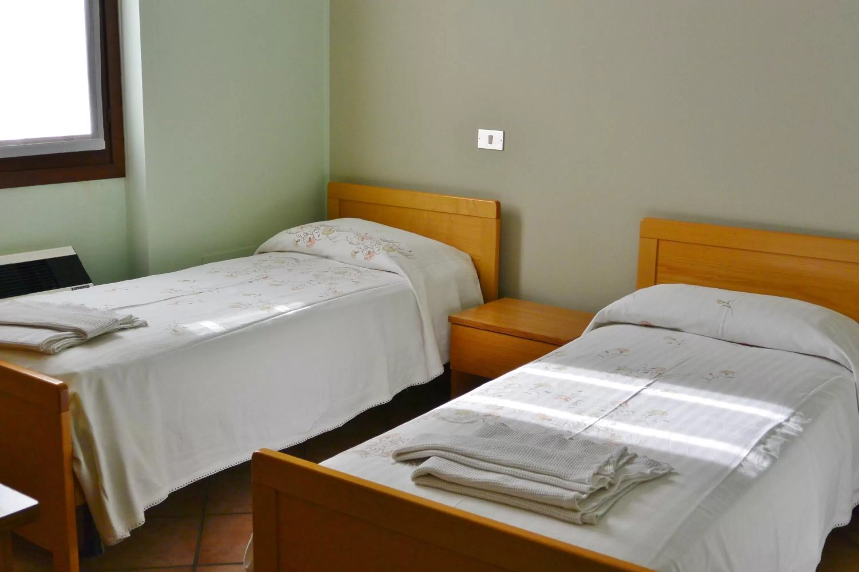 Bed in Albergo Escondido