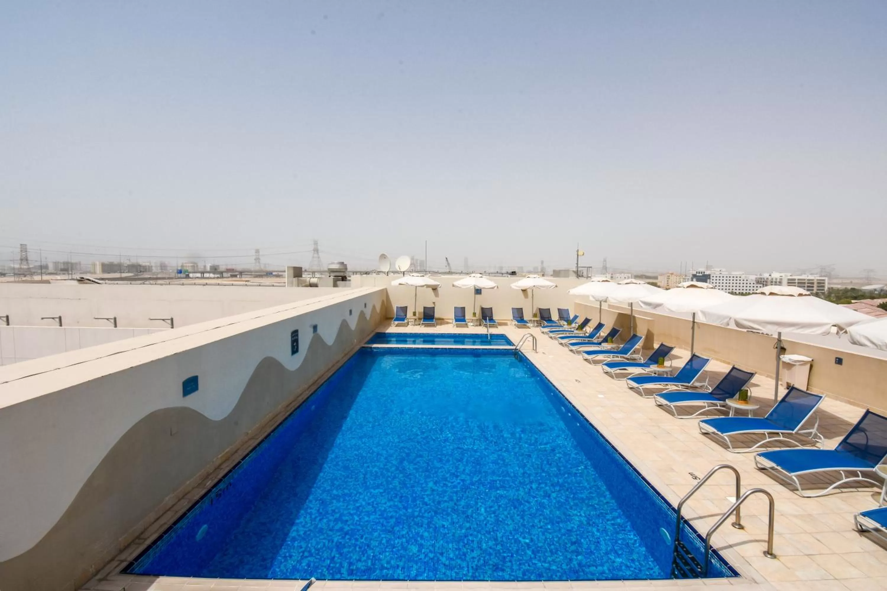 Swimming pool in Premier Inn Dubai Investments Park - An Emirates Group Company