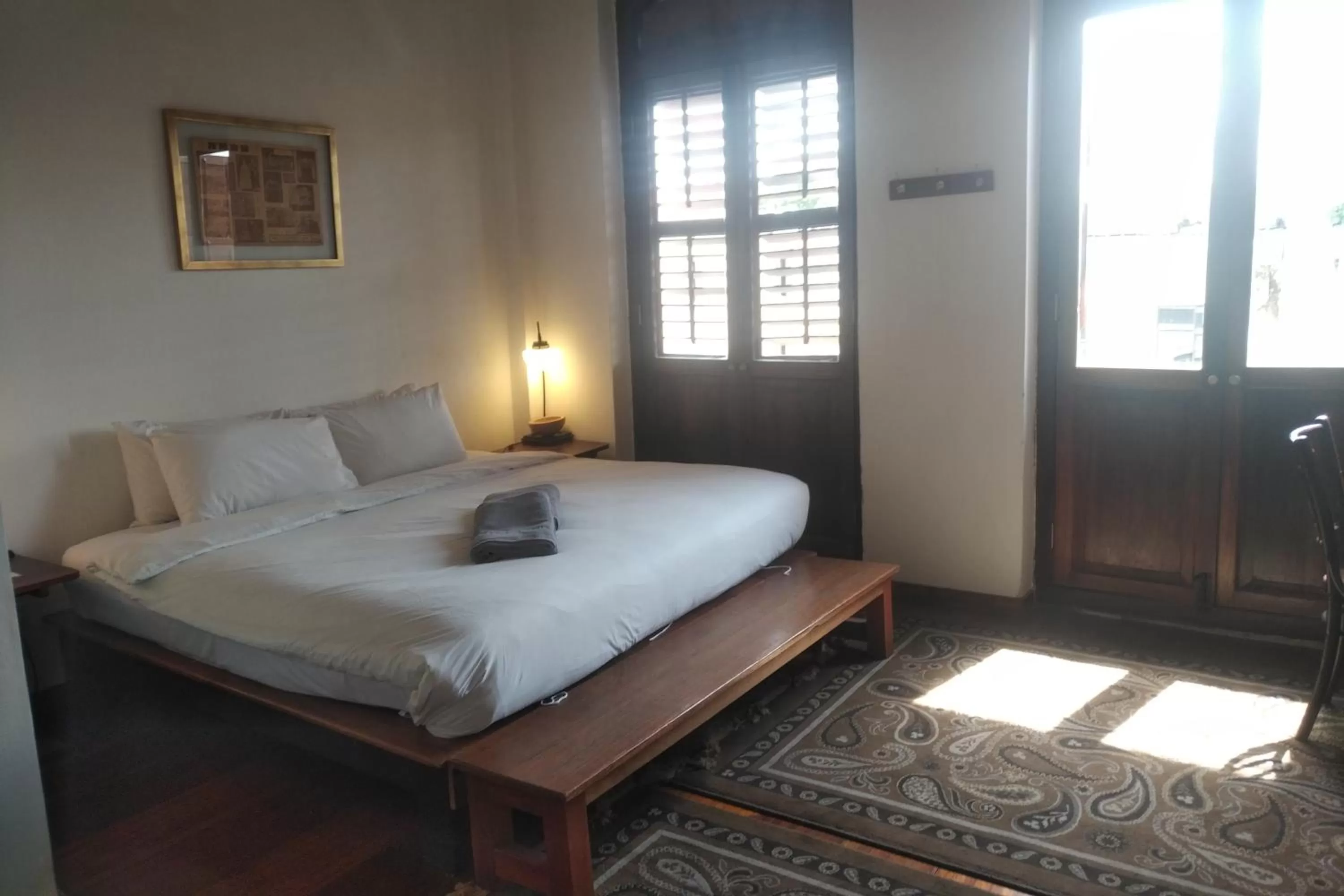 Bed in Ren I Tang Heritage Inn