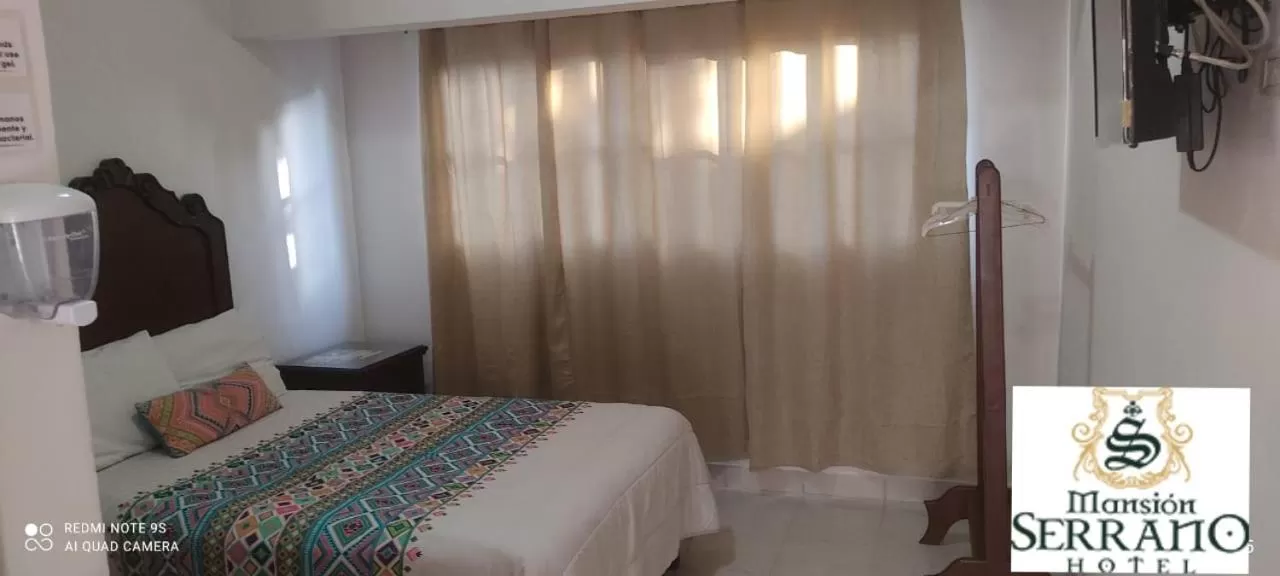 Bed in Mansion Serrano Hotel