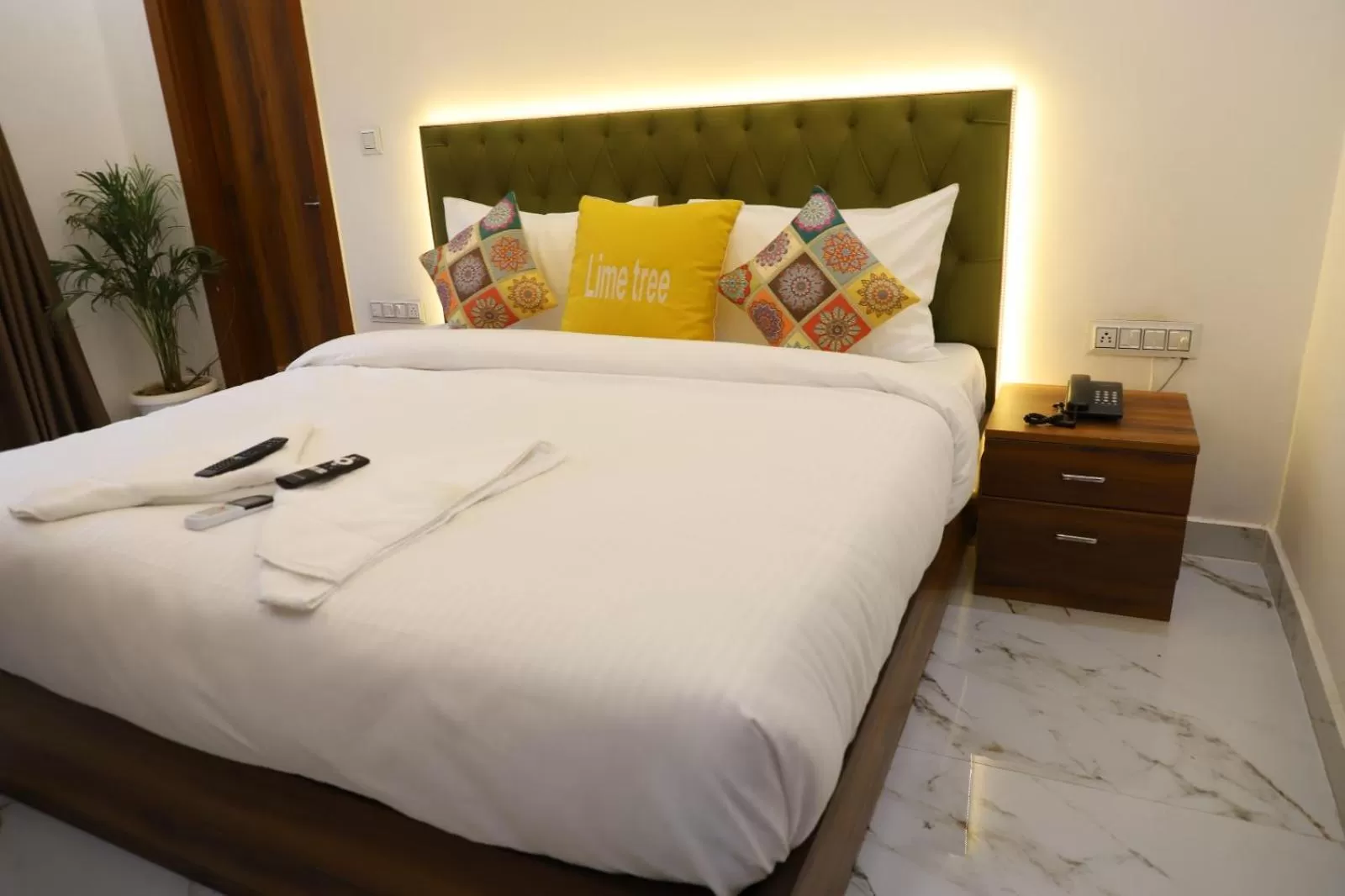 Bed in Opulent Inn by Lime Tree Hotels