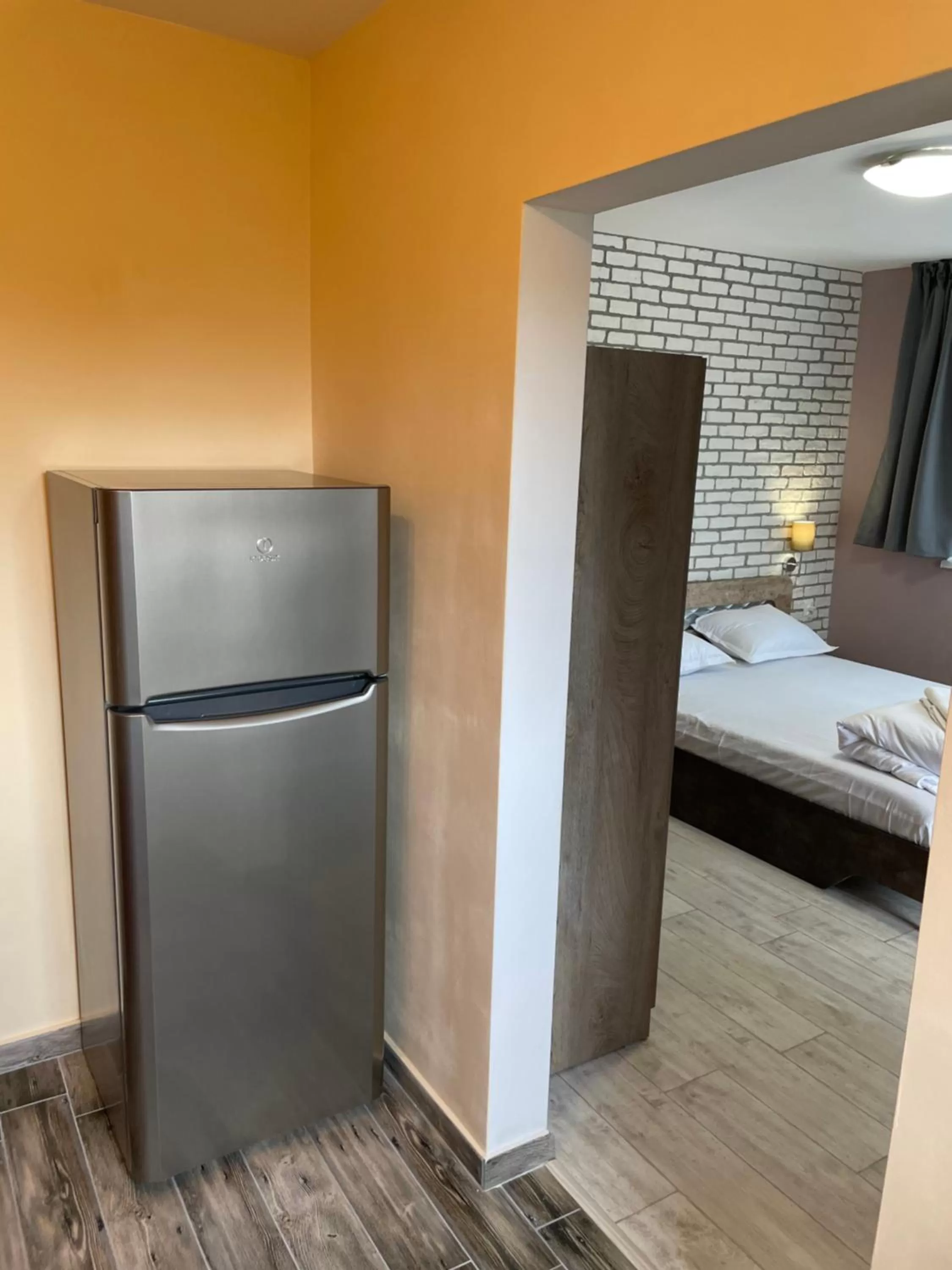 Bed in Family Hotel Malibu