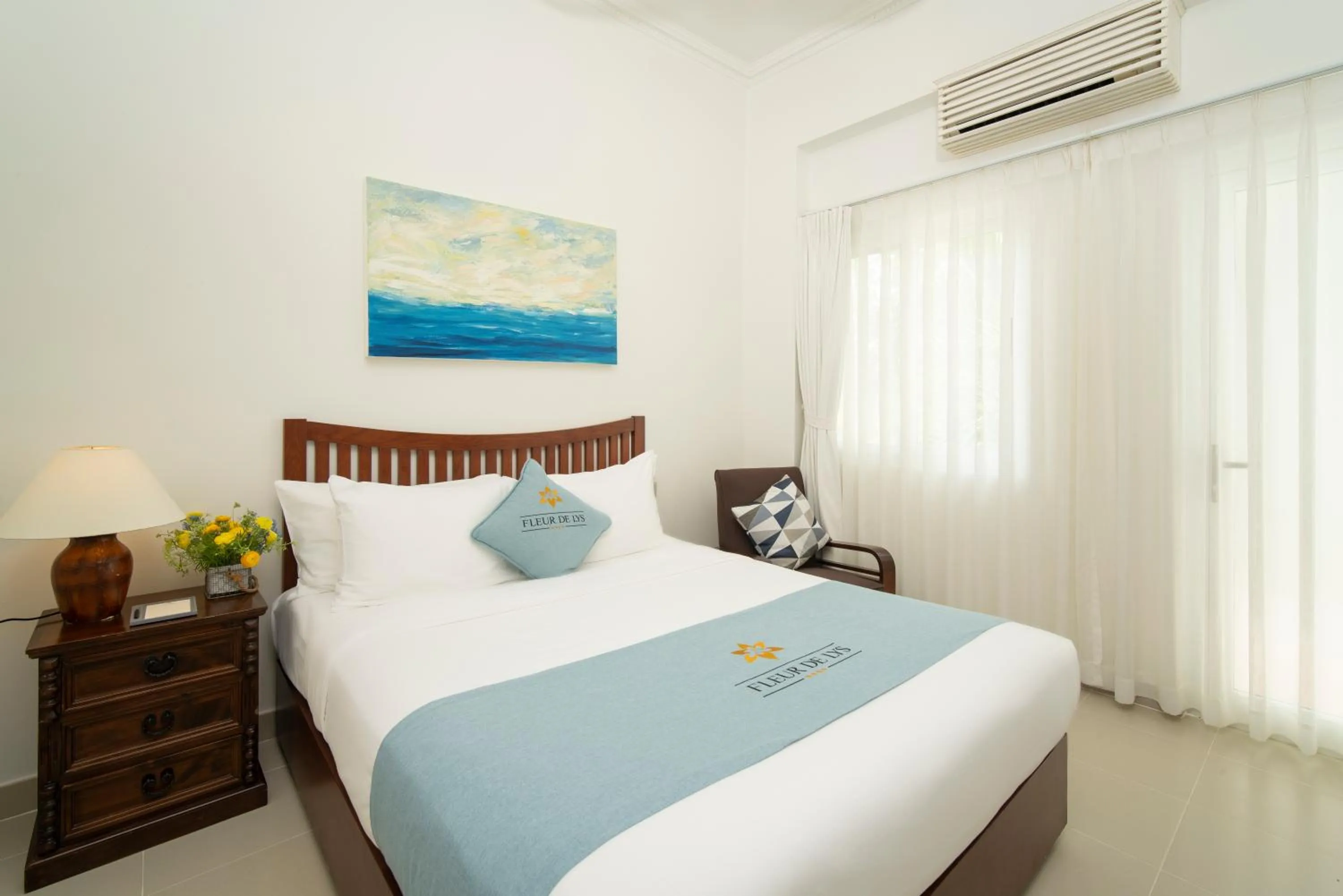 Bed in Fleur de Lys Resort & Spa Long Hai