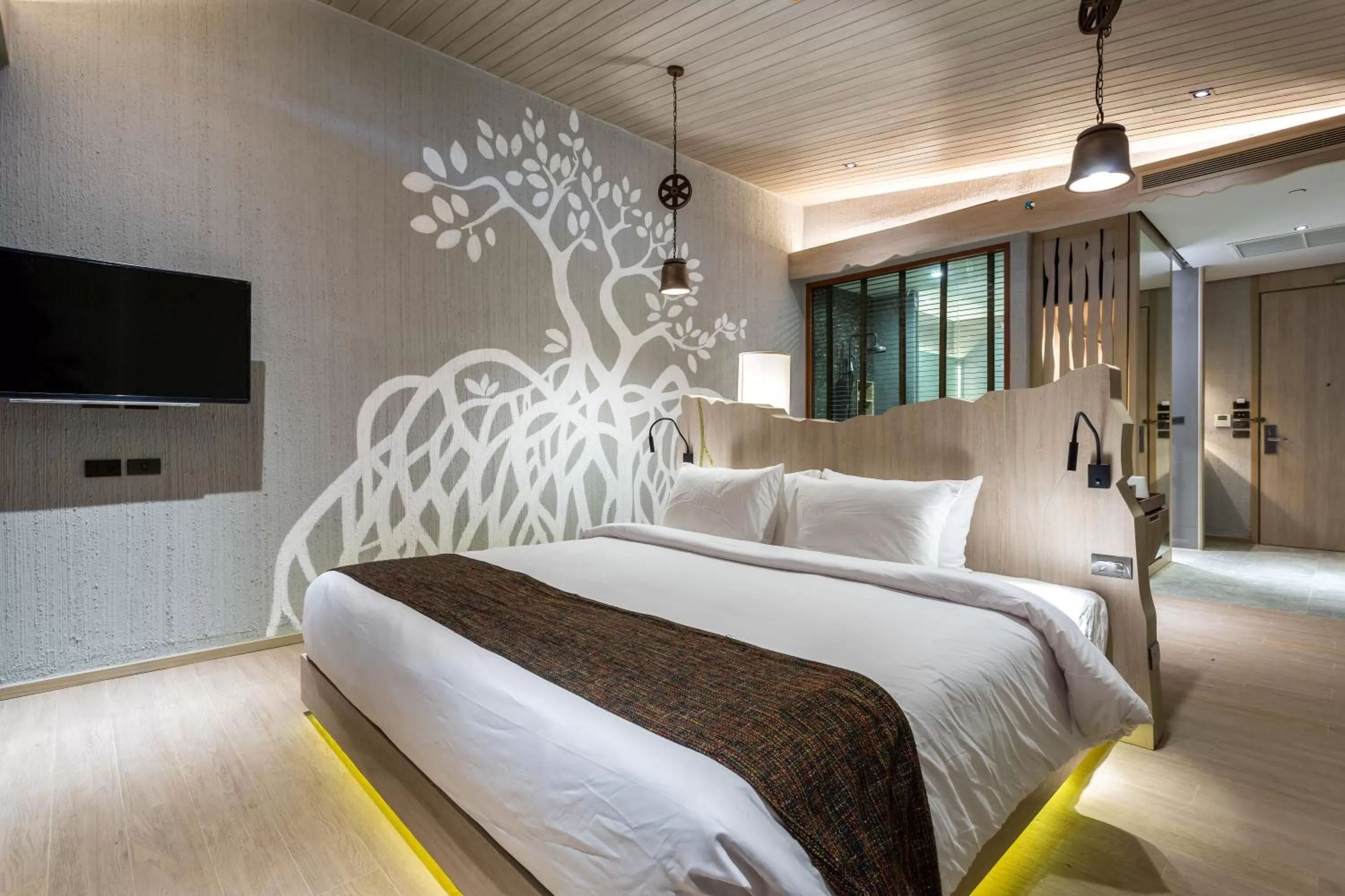 Bed in Kalima Resort and Villas Khao Lak