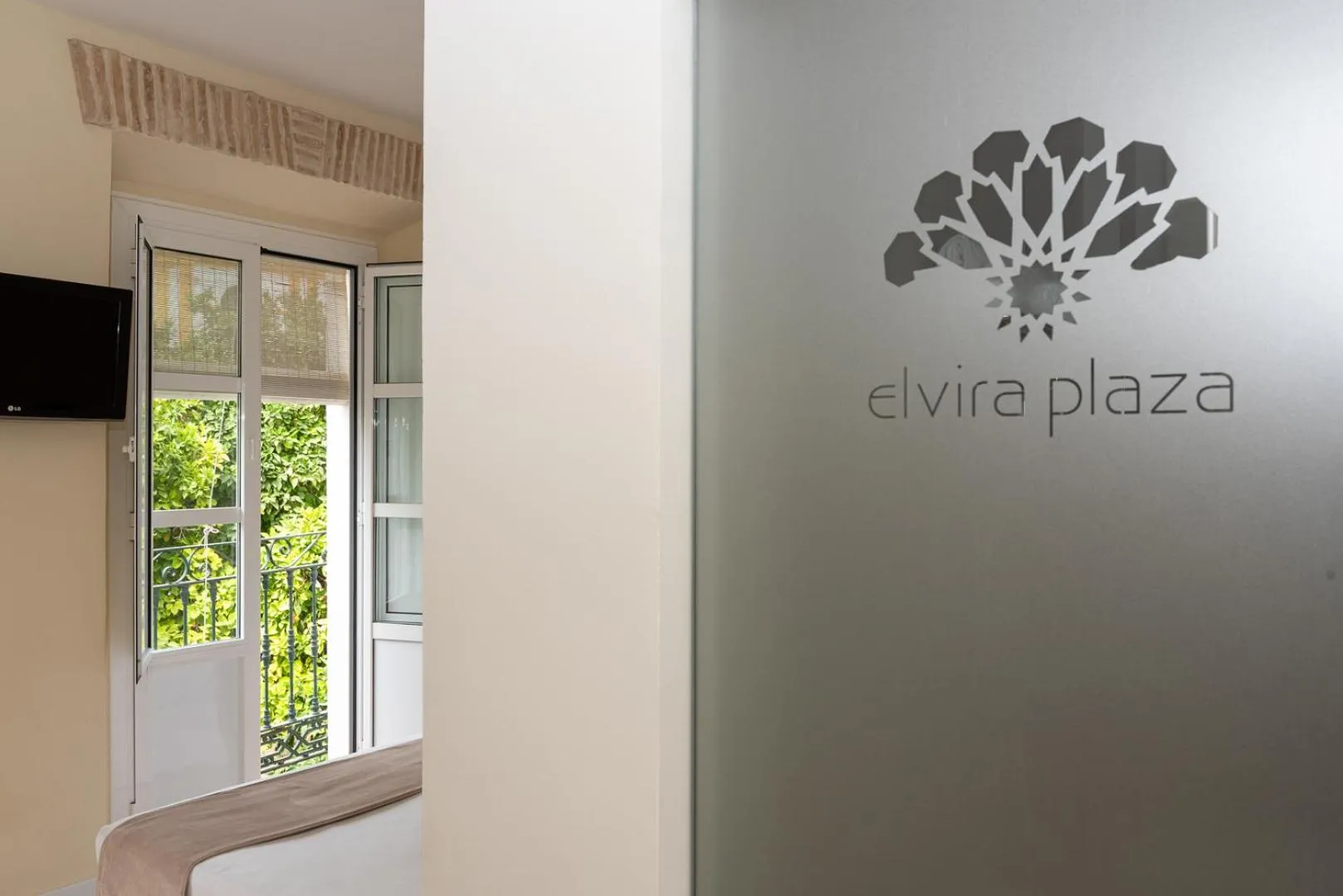 Property logo or sign in Hotel Boutique Elvira Plaza