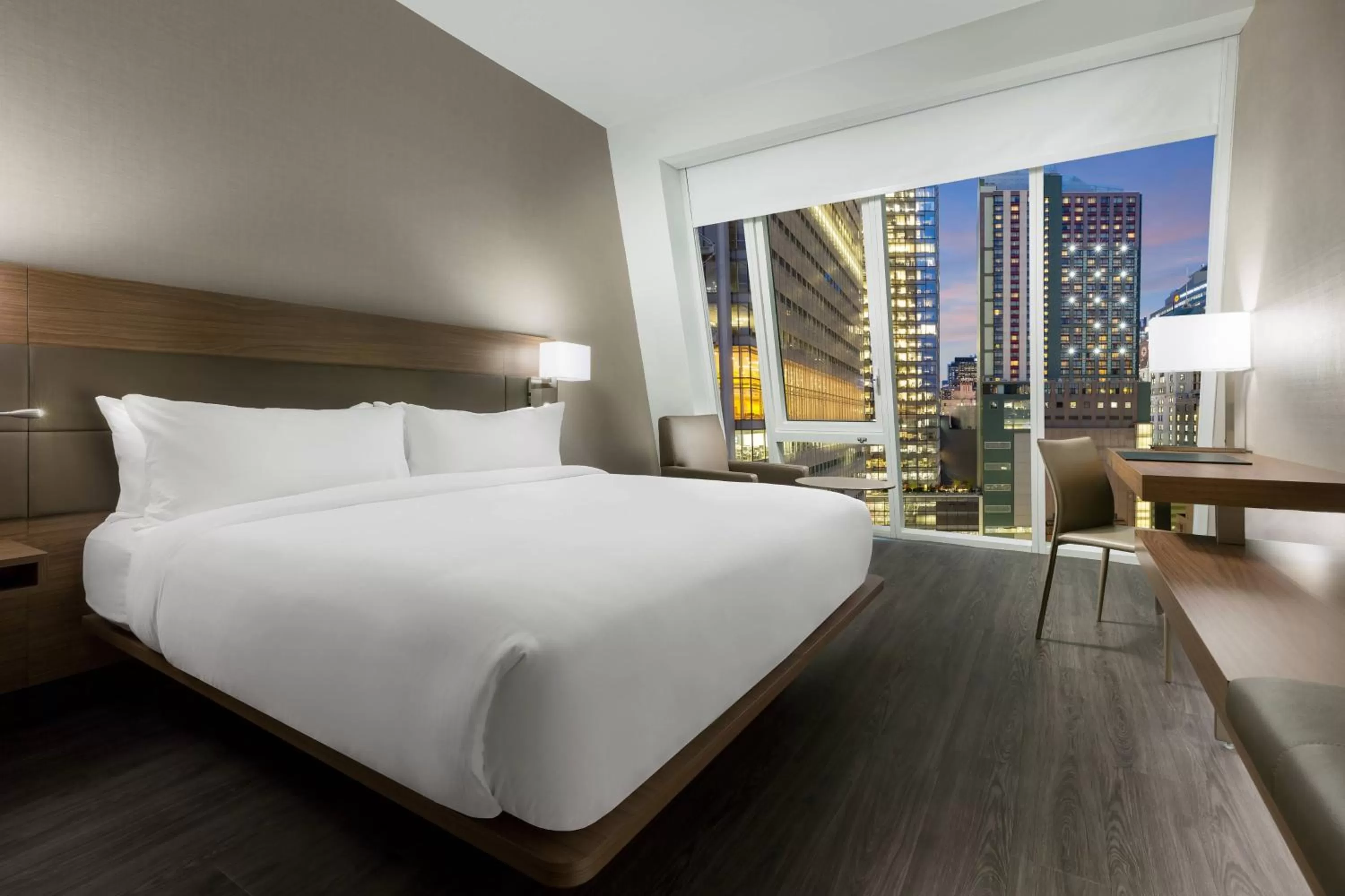 Photo of the whole room, Bed in AC Hotel by Marriott New York Times Square