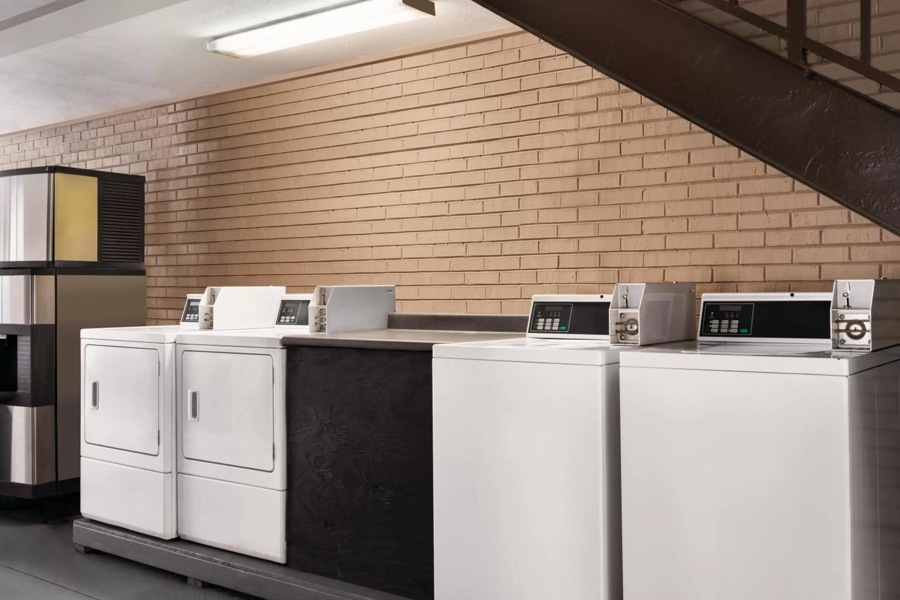 washing machine in Super 8 by Wyndham Gulfport Airport NW Near Biloxi