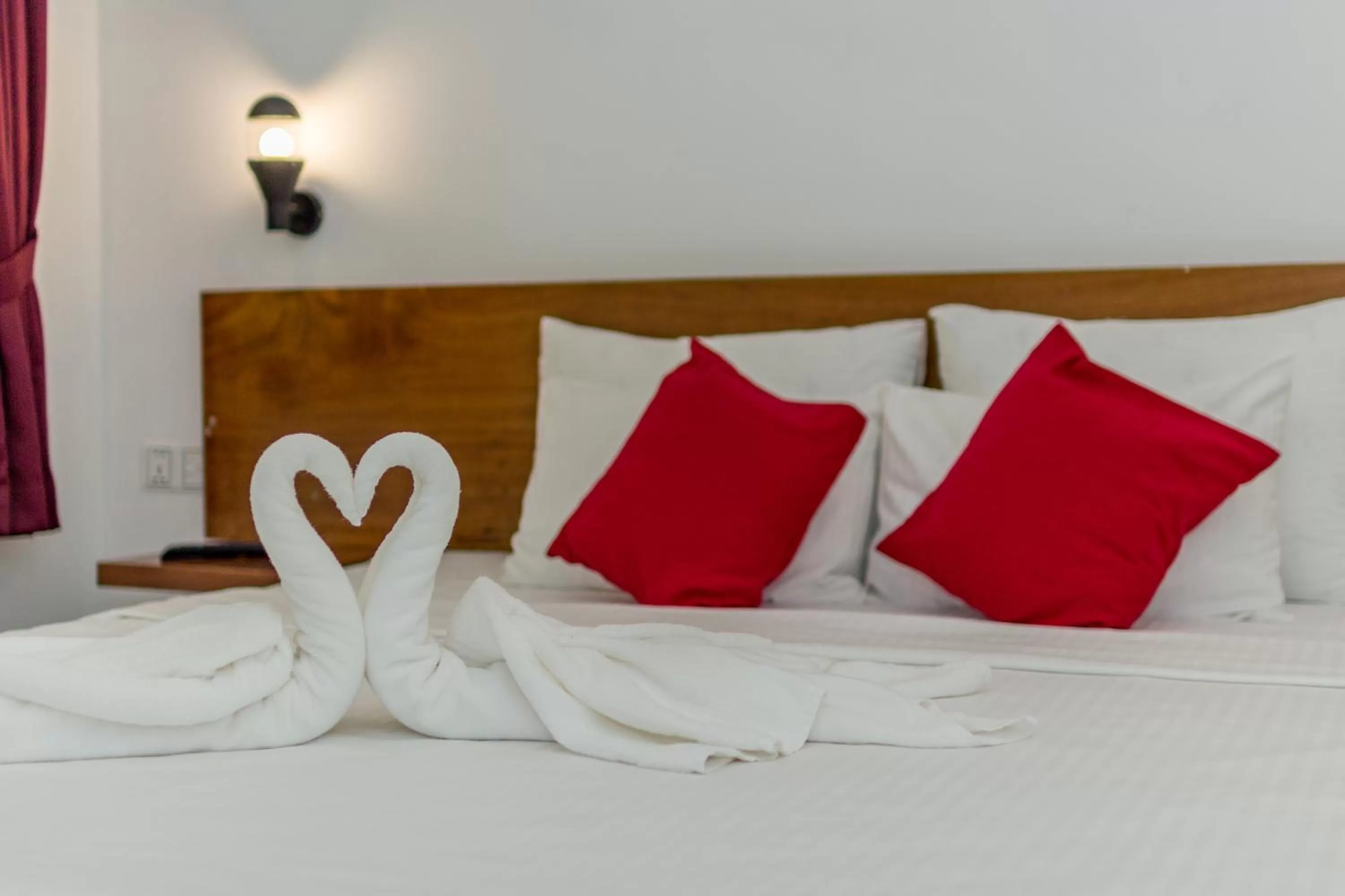 Bed in Poolside Villa