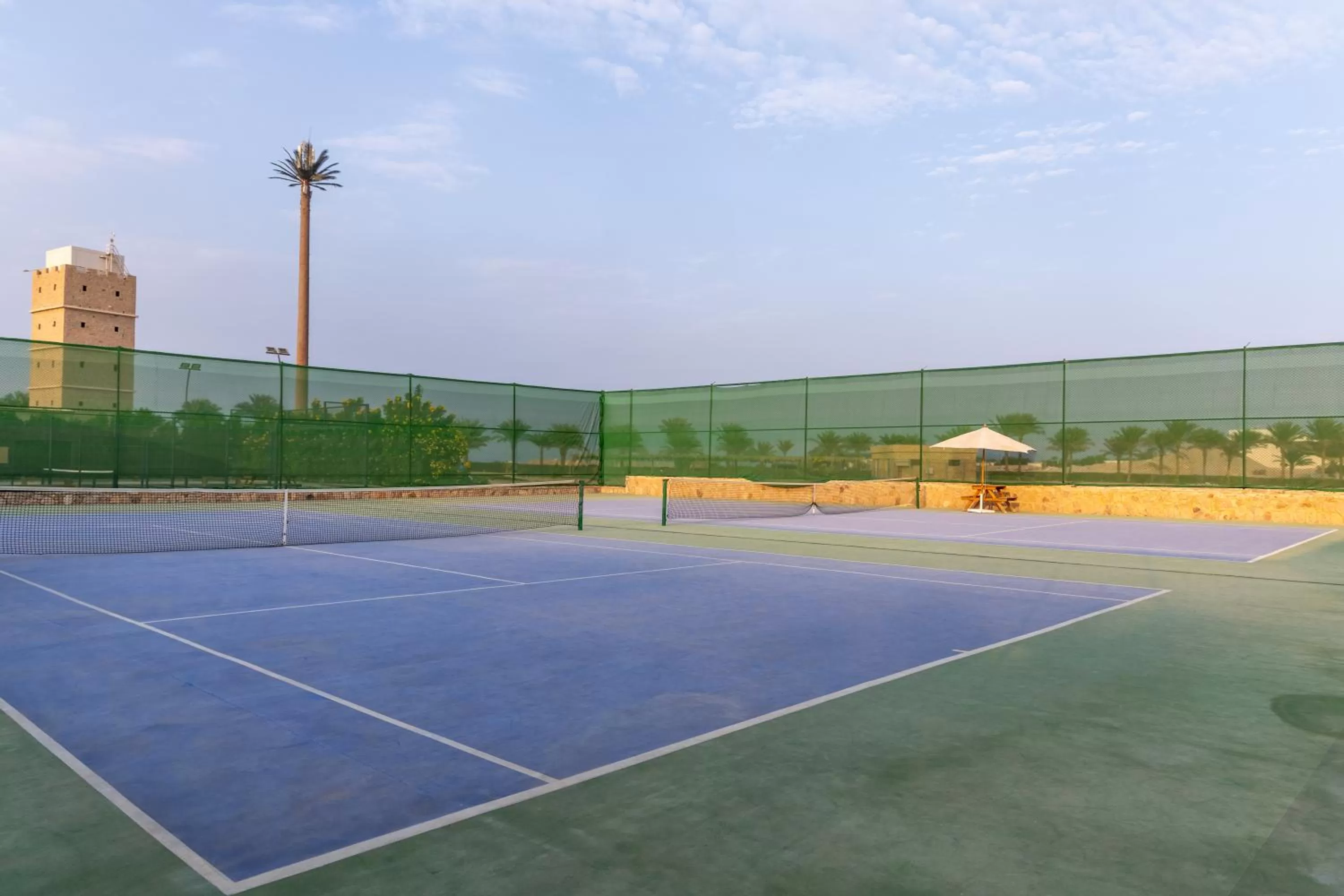 Tennis court in Fort Arabesque Resort, Spa & Villas