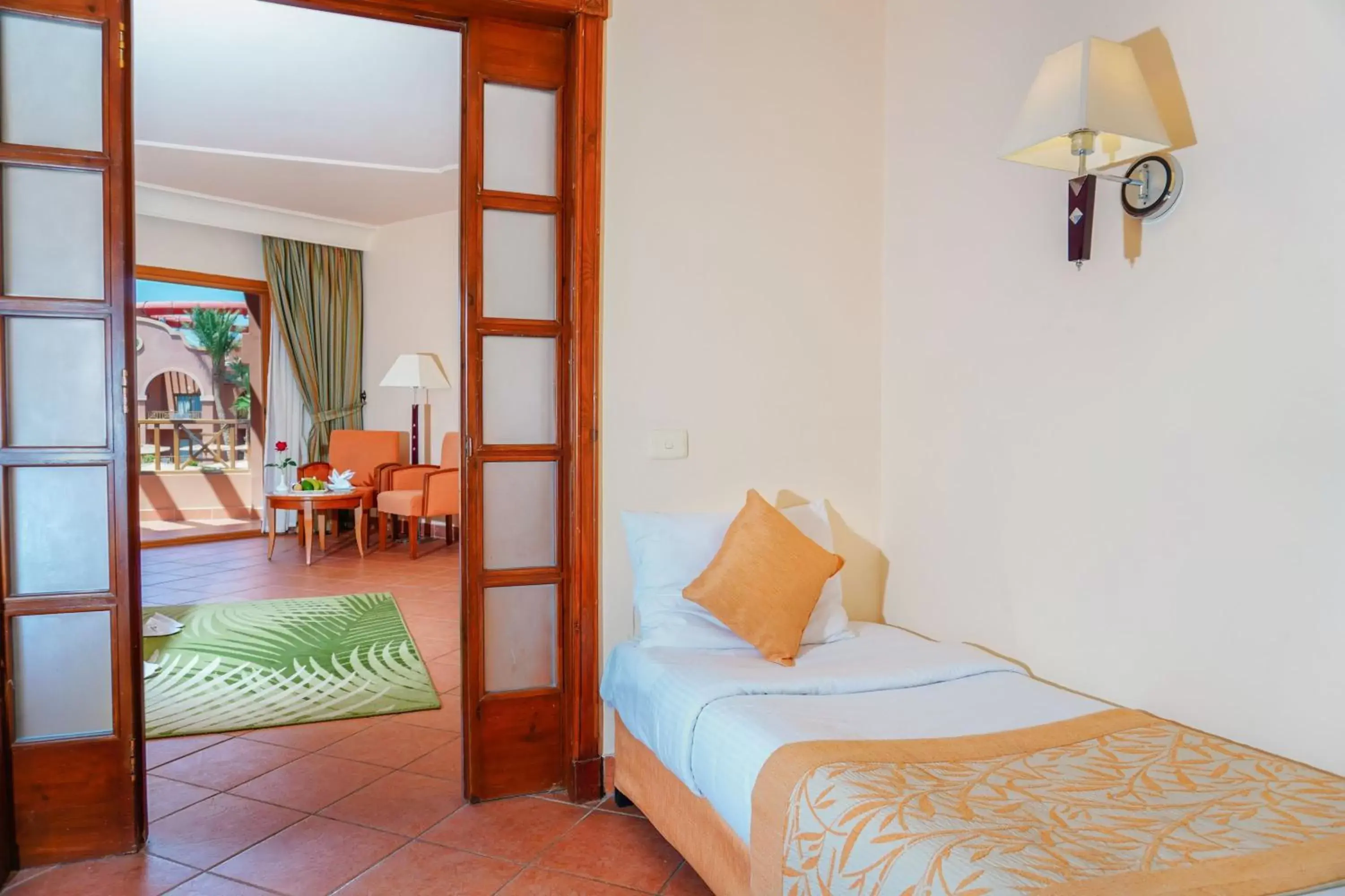 Family Room Pool View (3 Adults + 1 Child) in Charmillion Gardens Aquapark Family Room Pool View (3 Adults + 1 Child) in Charmillion Gardens Aquapark