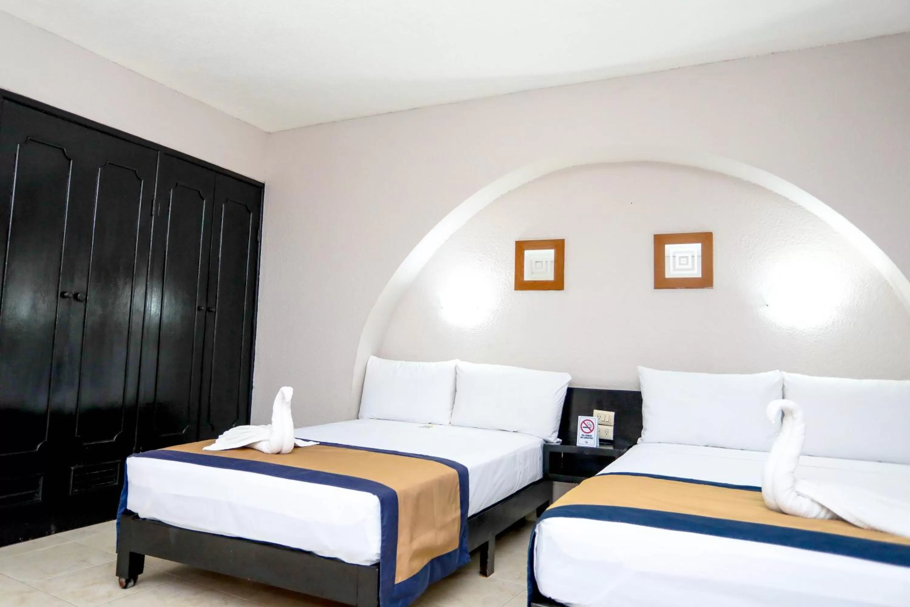 Bed in Hotel Caribe Internacional Cancun