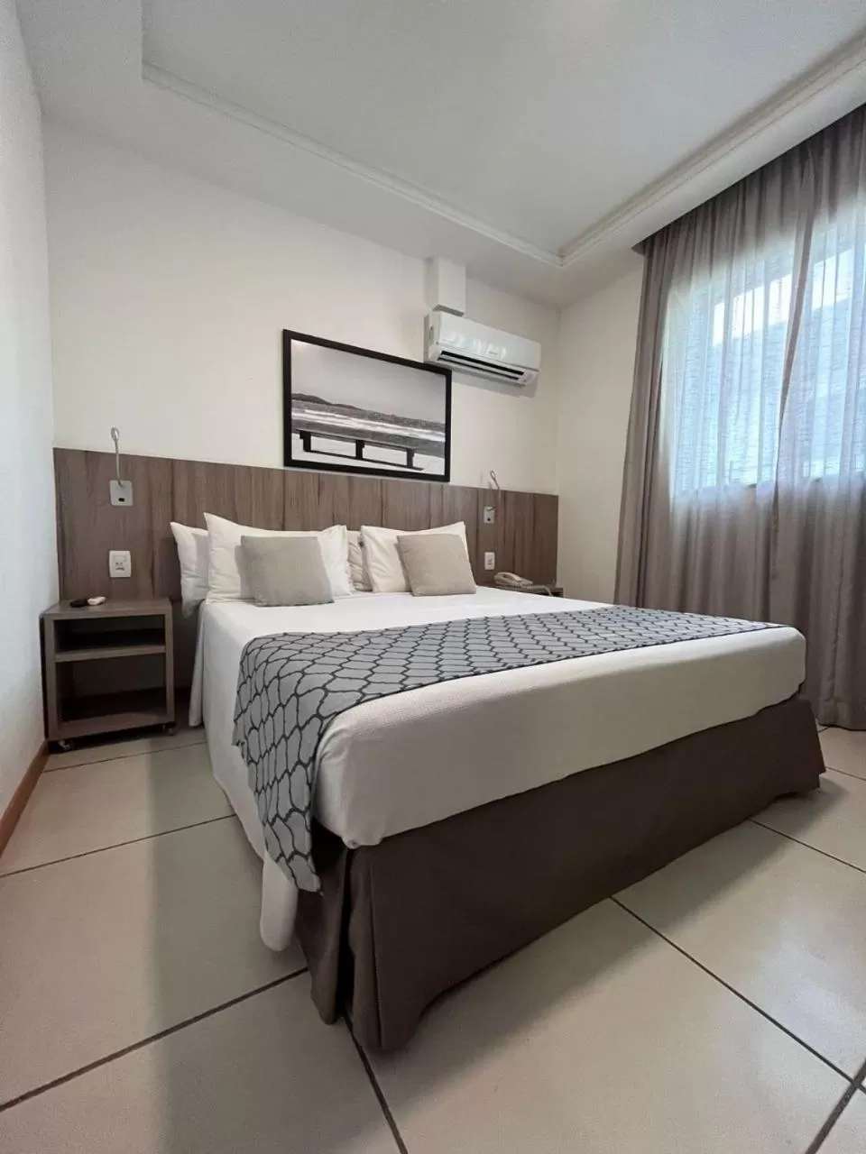 Bed in Oásis Cabo Frio Hotel