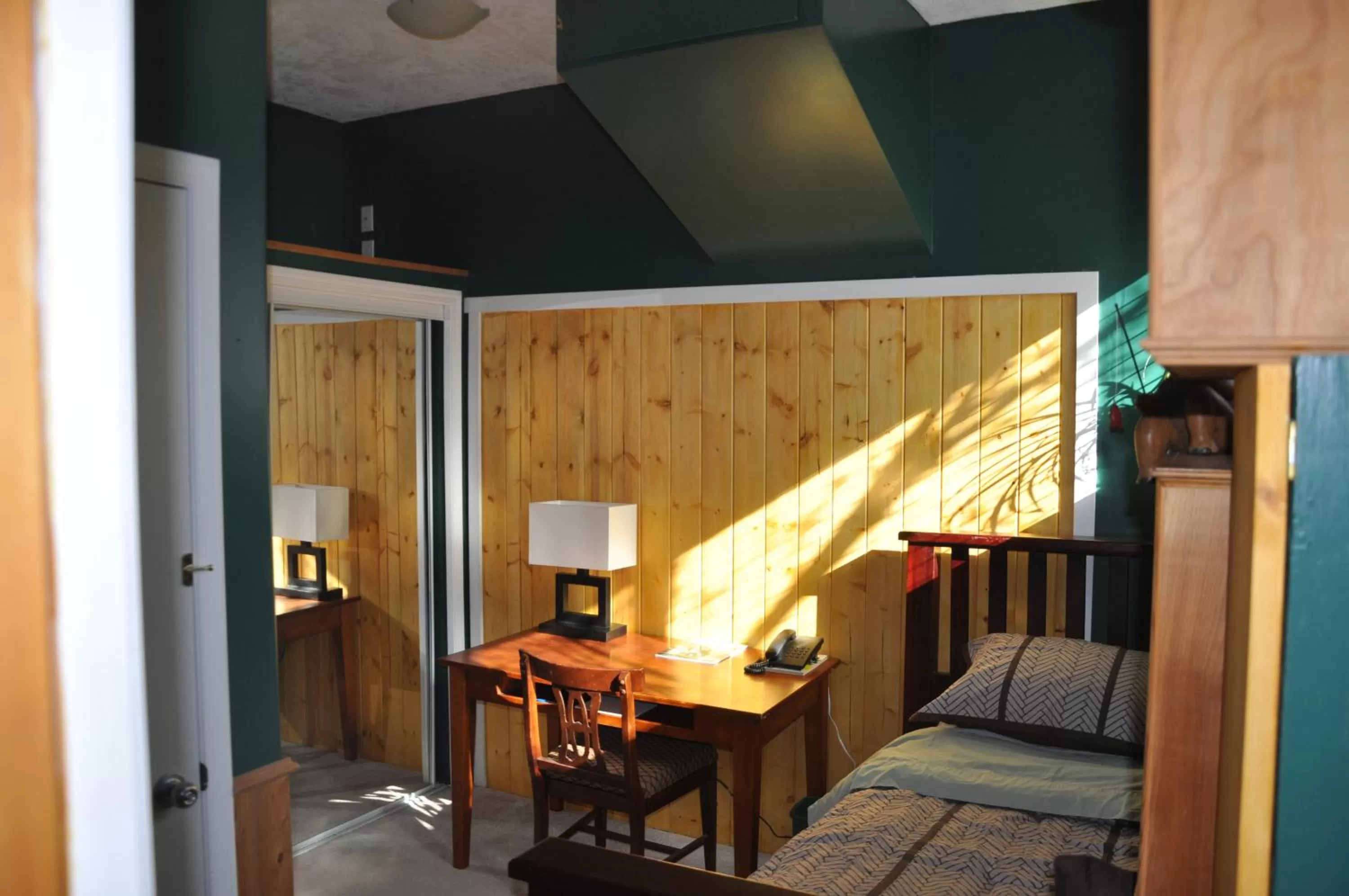 Bedroom in Birds of a Feather Victoria Oceanfront Studio Suites