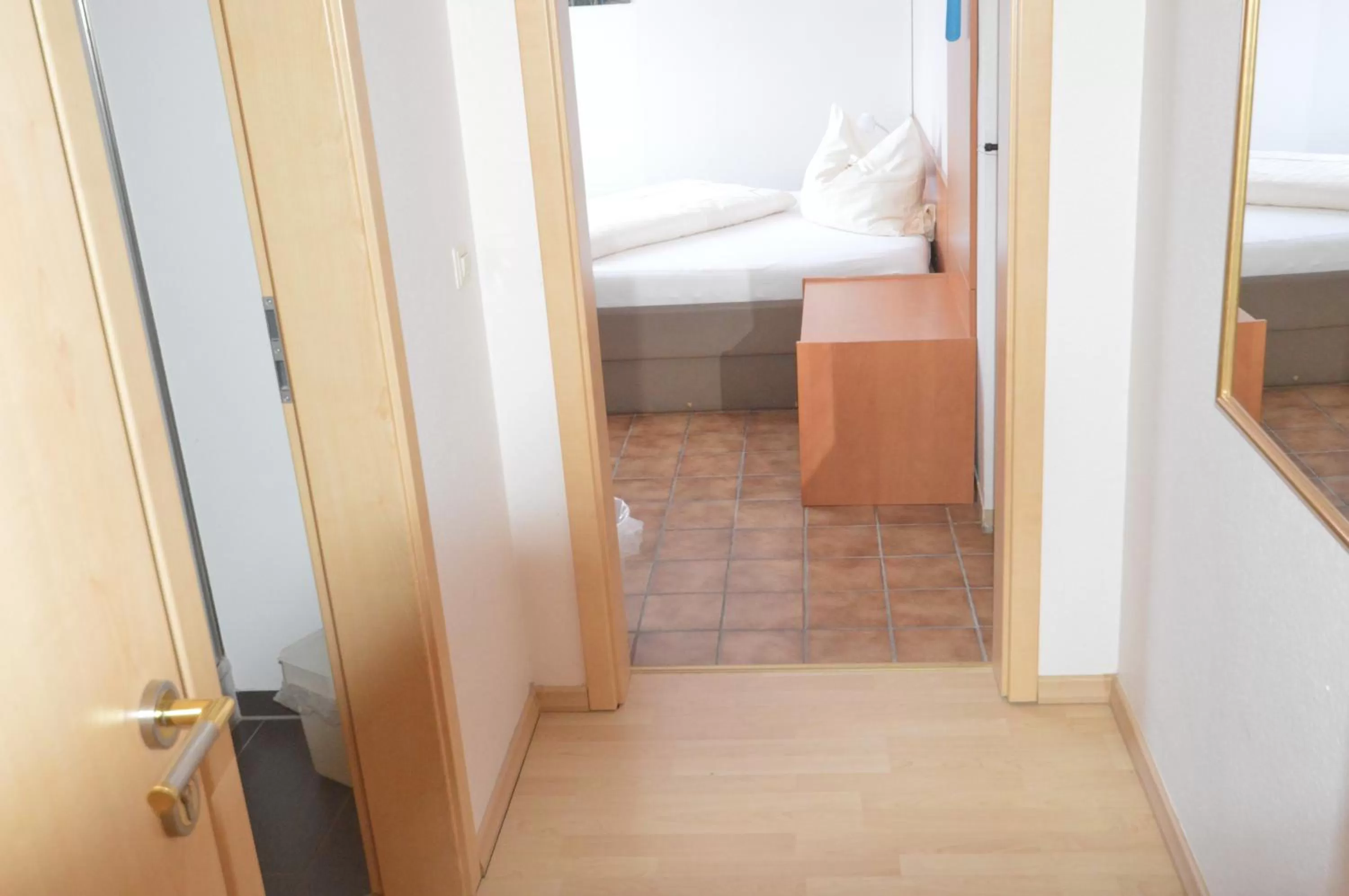 Bed, Bathroom in Aktivhotel Alter Kaiser