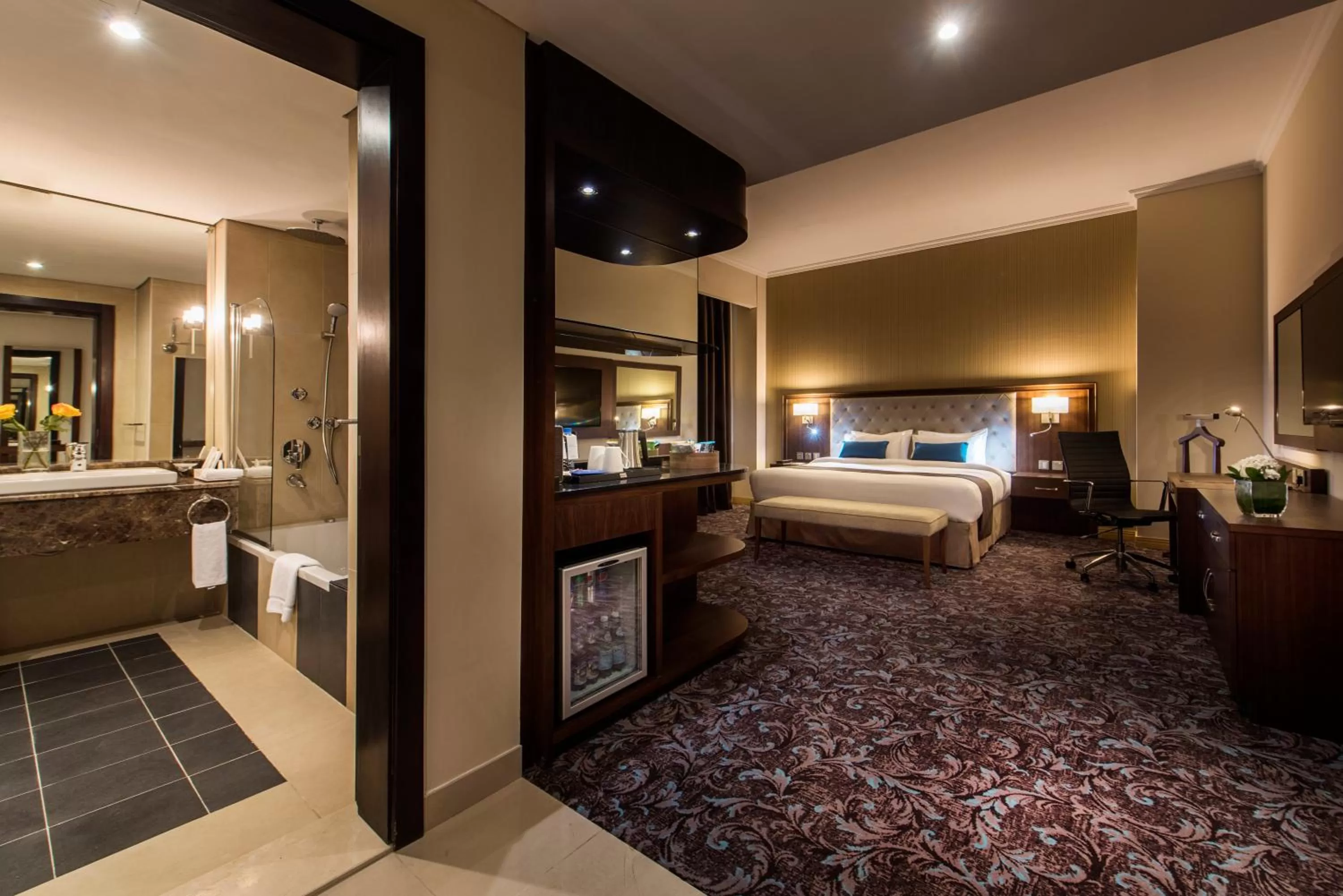 Bed in Golden Tulip Doha Hotel