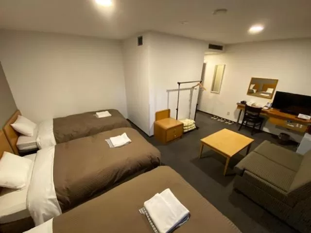 Bed in Hotel New Yutaka