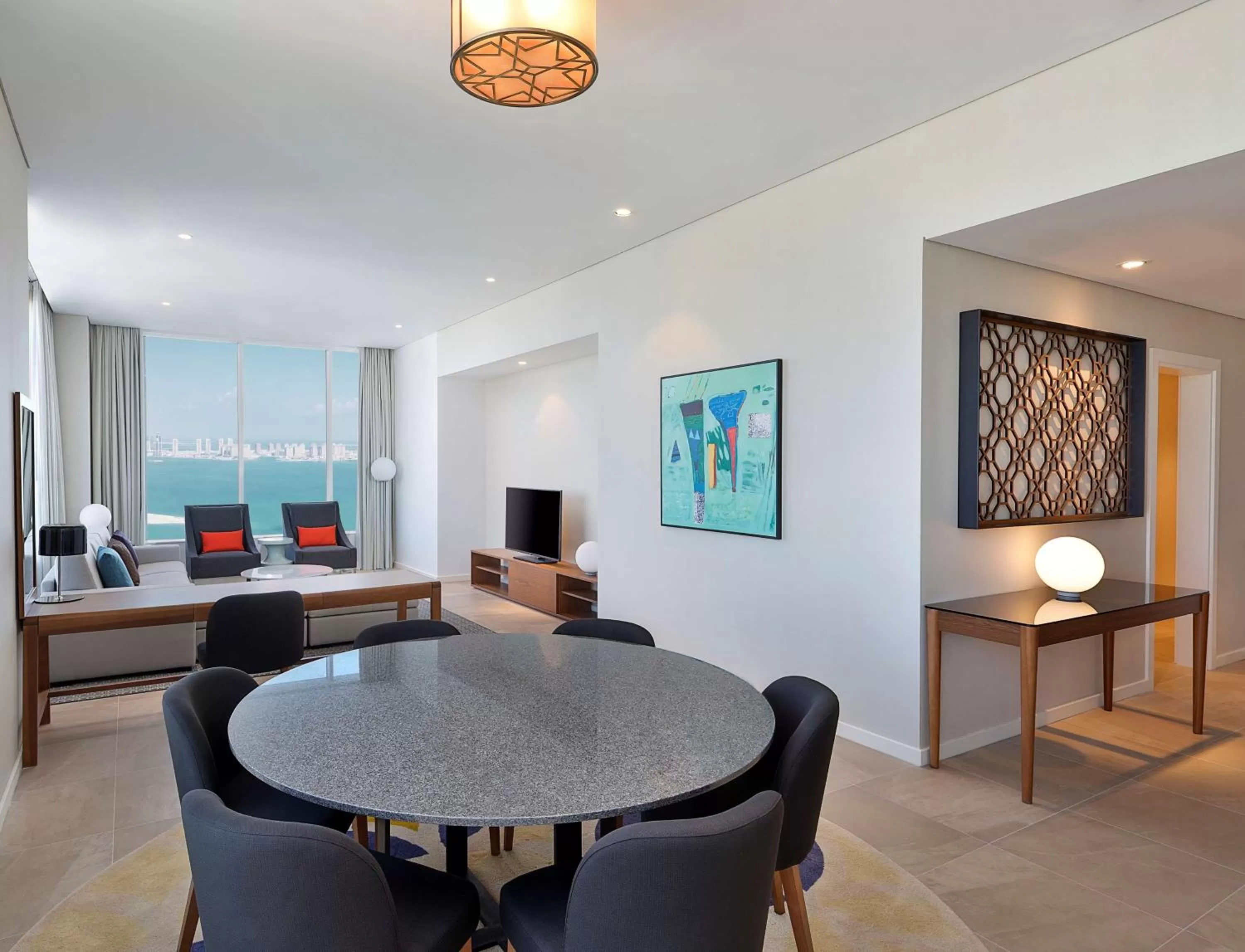 Living room in Aleph Doha Residences, Curio Collection By Hilton