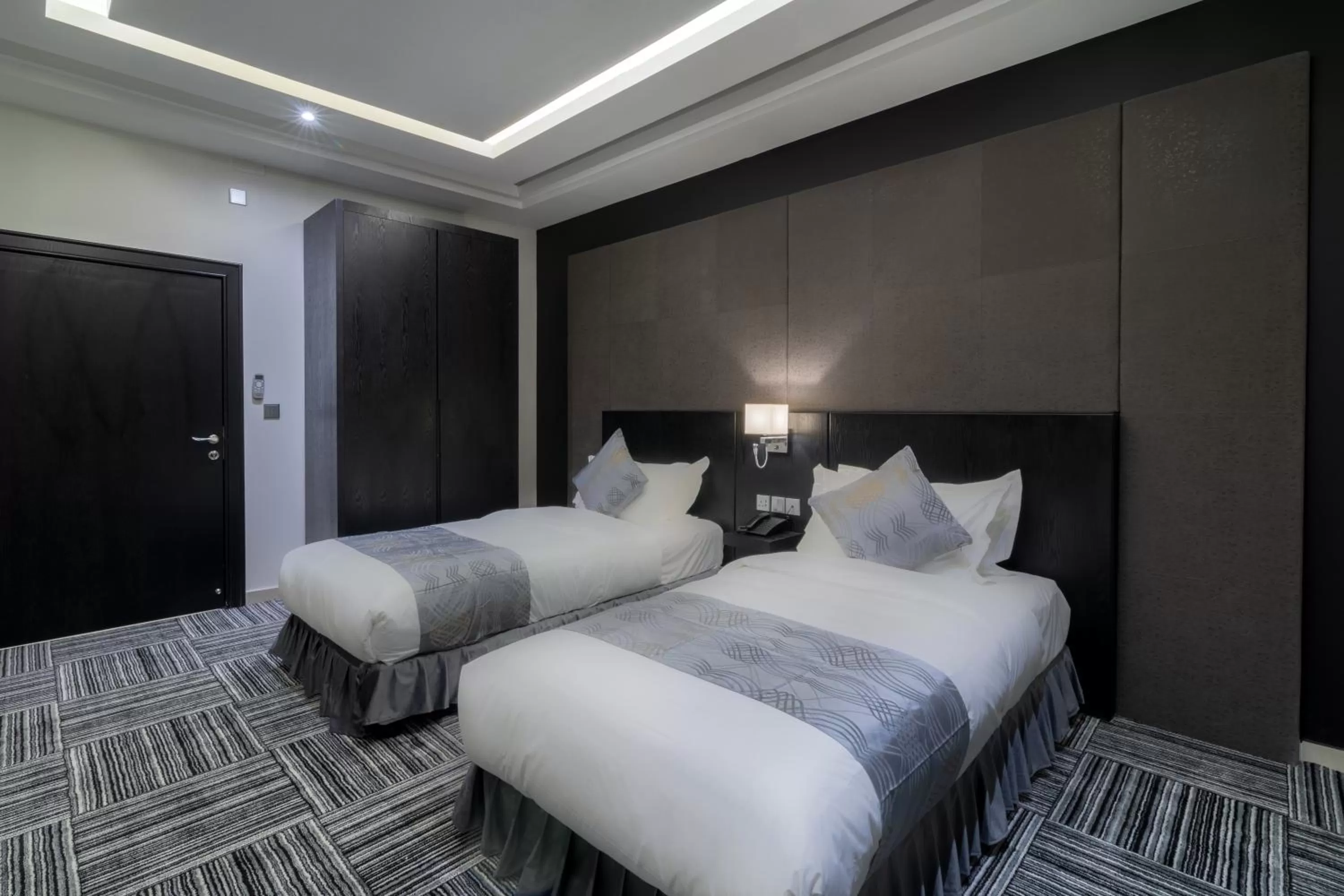 Bed in South Hotel Suites