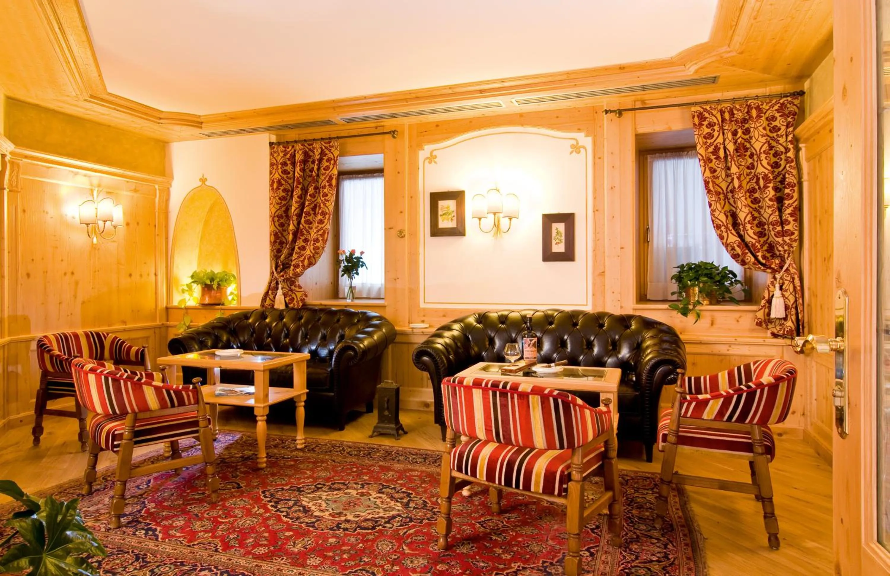 Communal lounge/ TV room in Boutique Hotel Diana