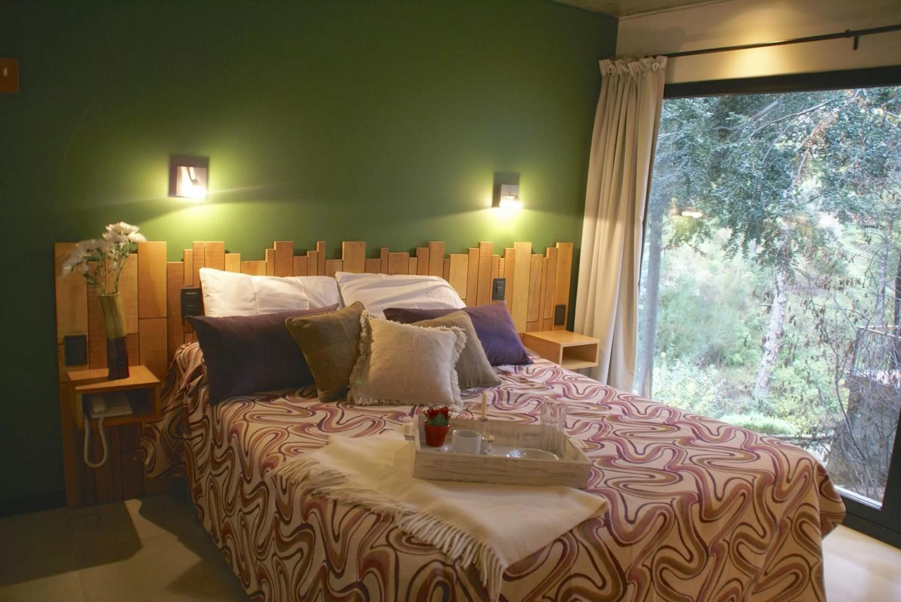 Bed in El Oasis Apart Hotel