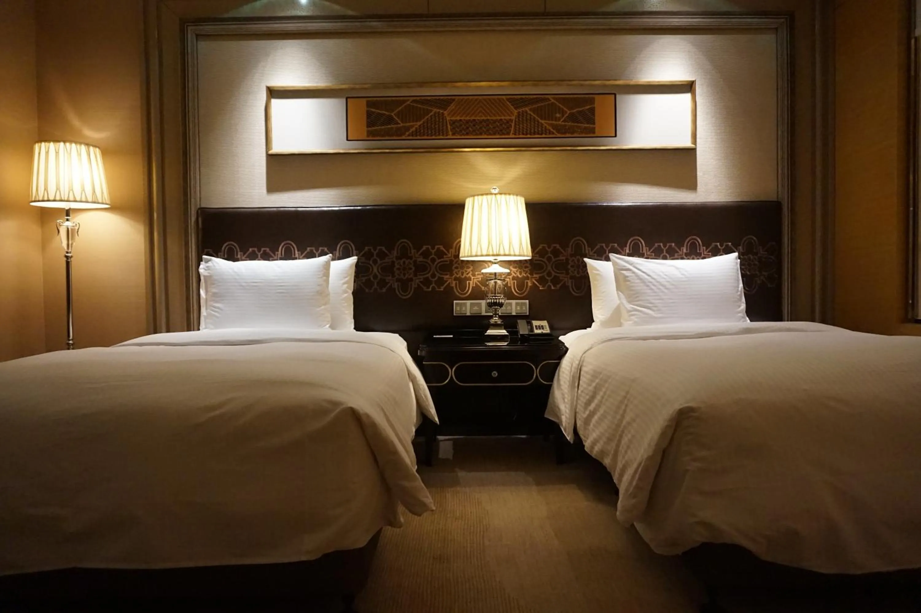 Bed in Wanda Realm Harbin Hotel