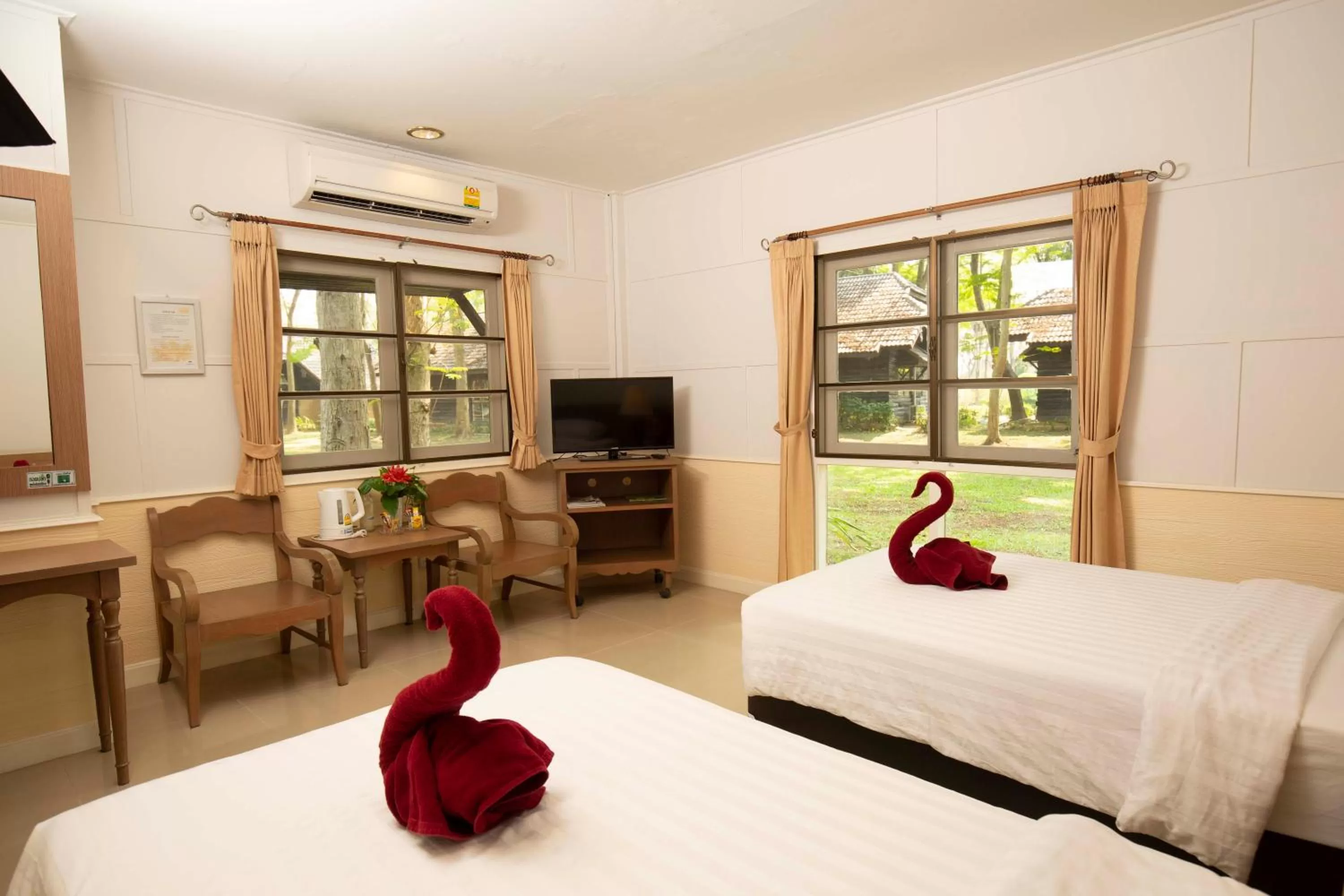 Bed in The Legacy River Kwai Resort