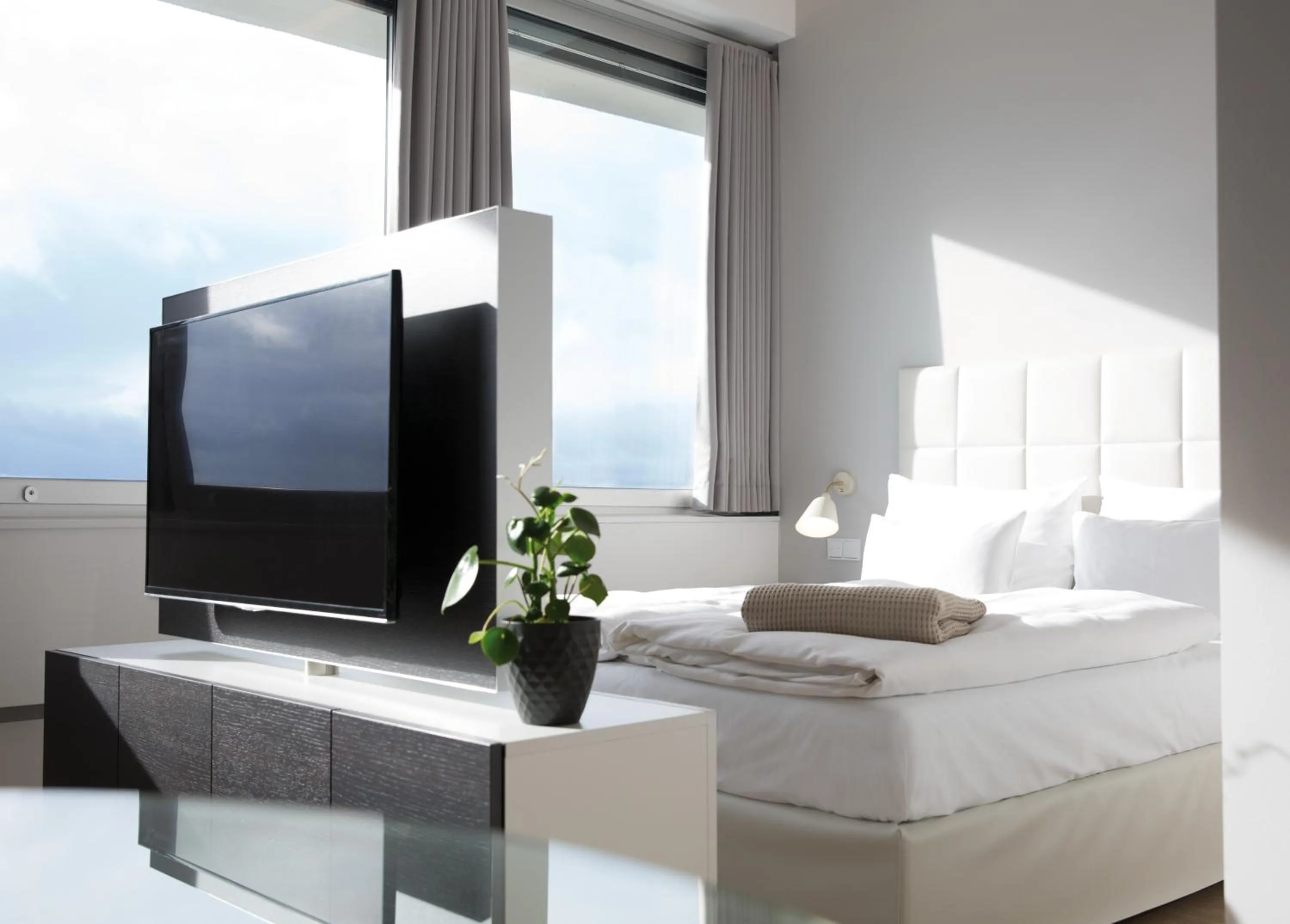 Bed in PhilsPlace Full-Service Apartments Vienna