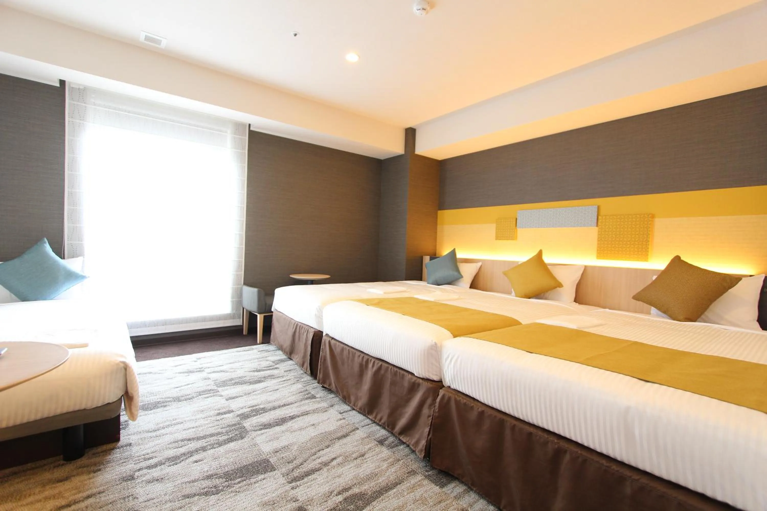 Bed in KOKO HOTEL Tsukiji Ginza