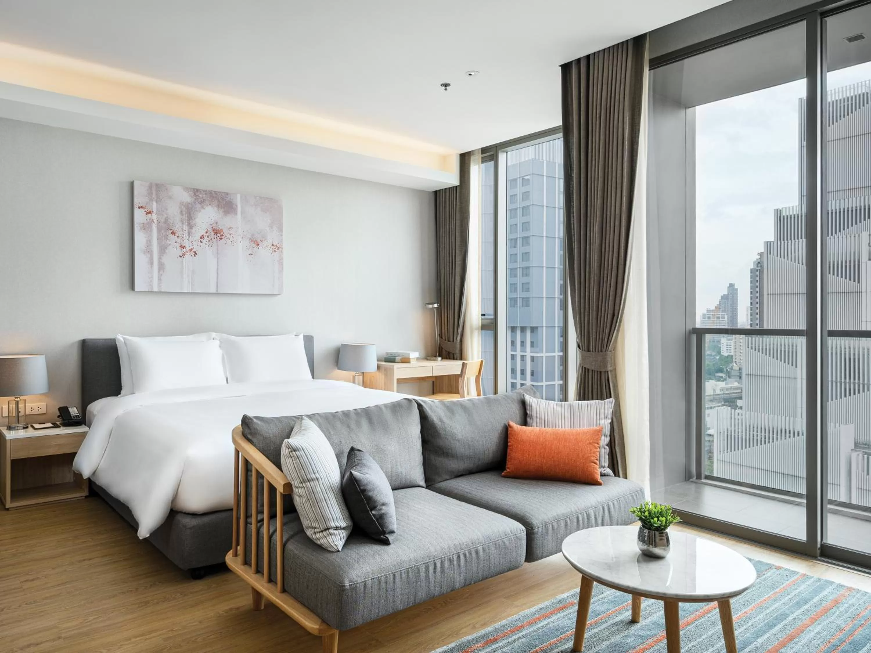 Bed in Oakwood Suites Bangkok