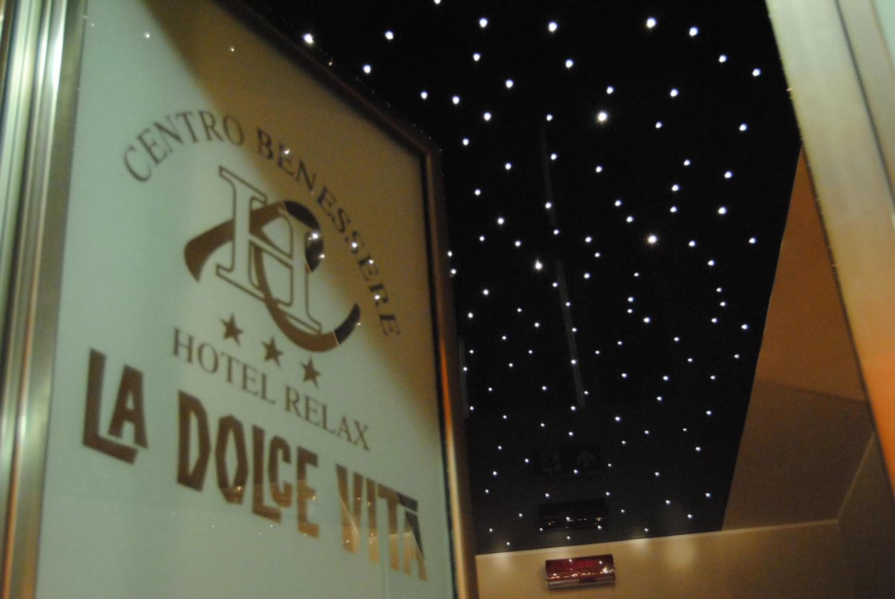 Property logo or sign in Hotel Relax