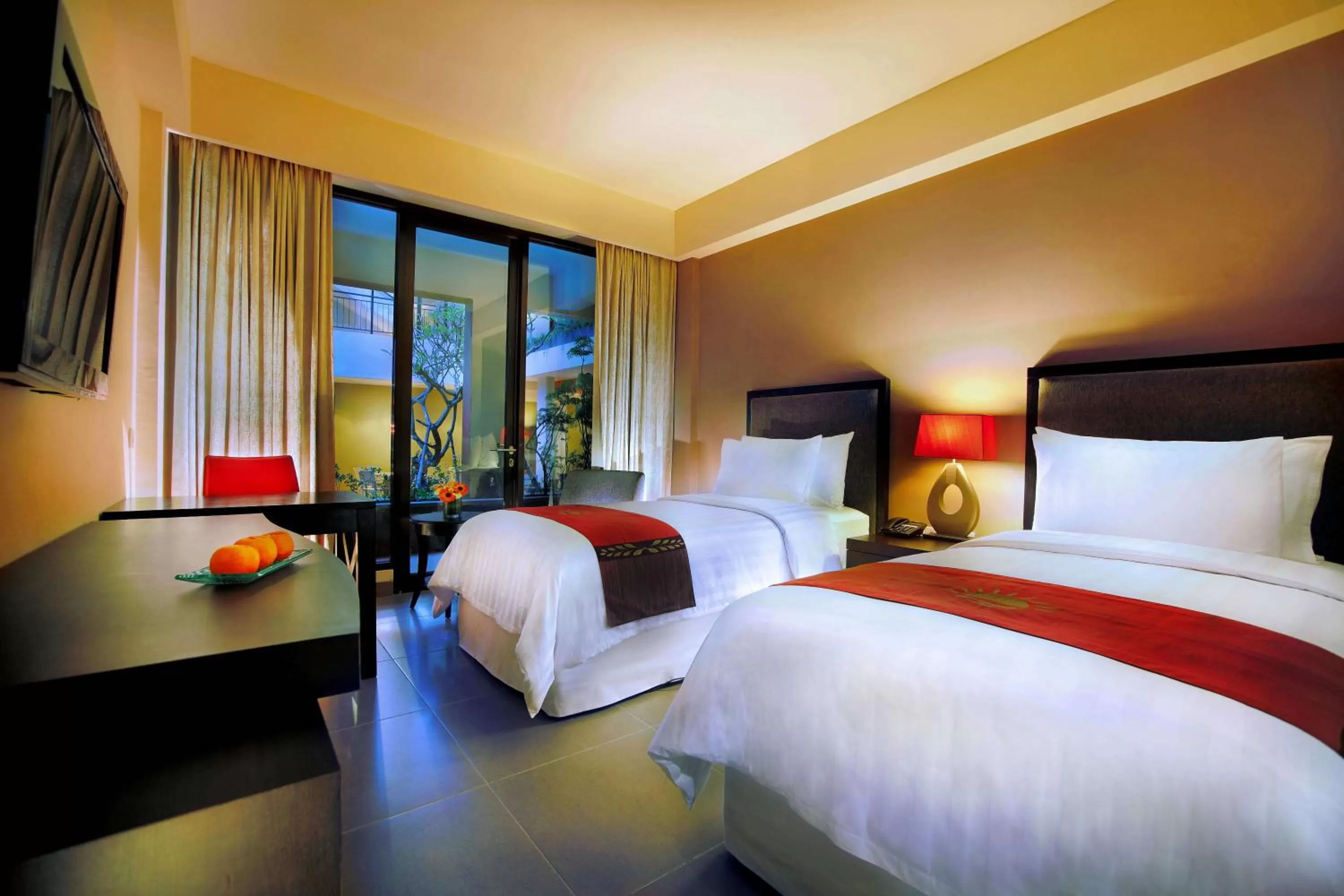 Bed in 100 Sunset Kuta Hotel & Ballroom