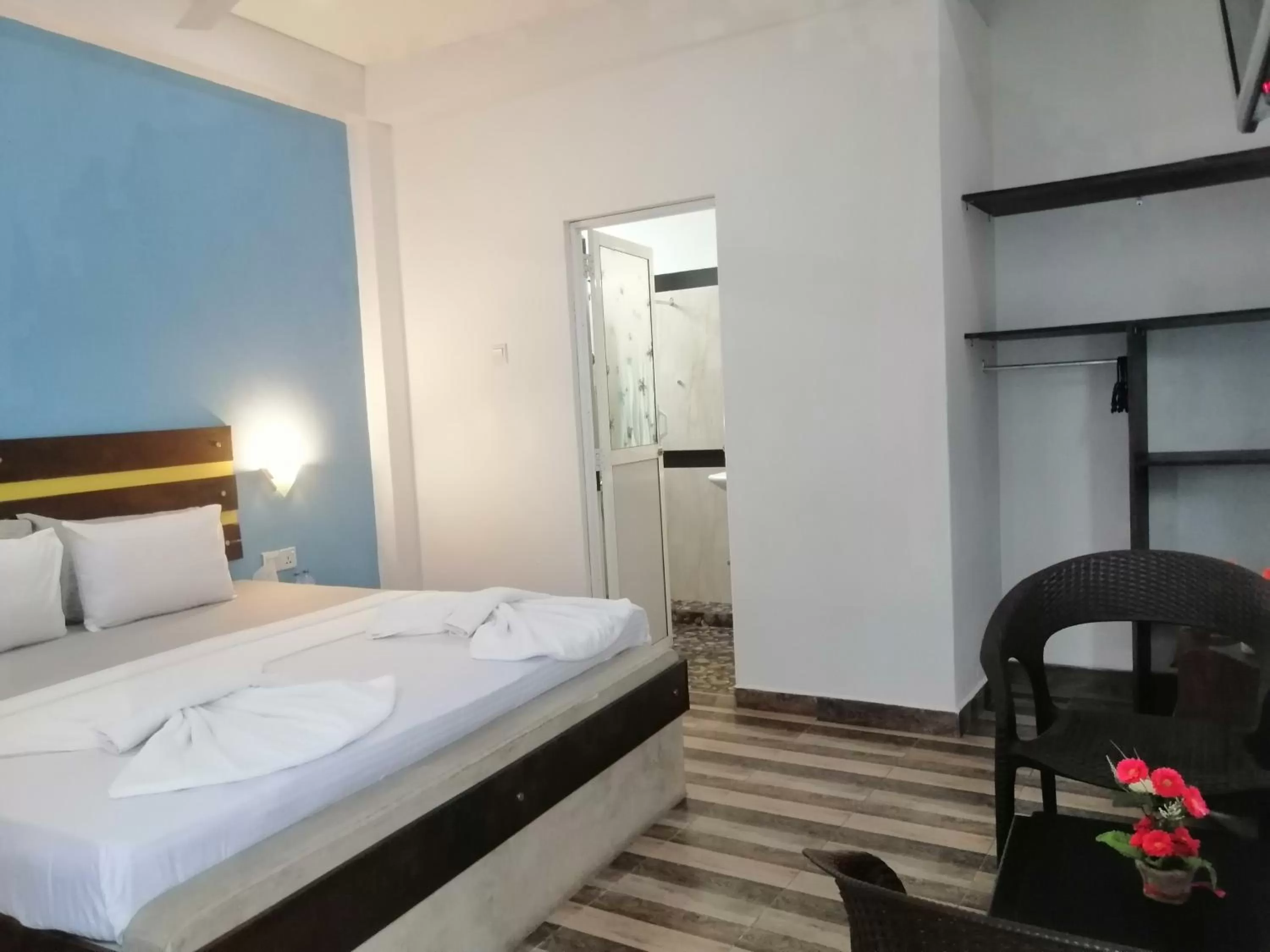 Bed in Le Petit Hotel & Restaurant